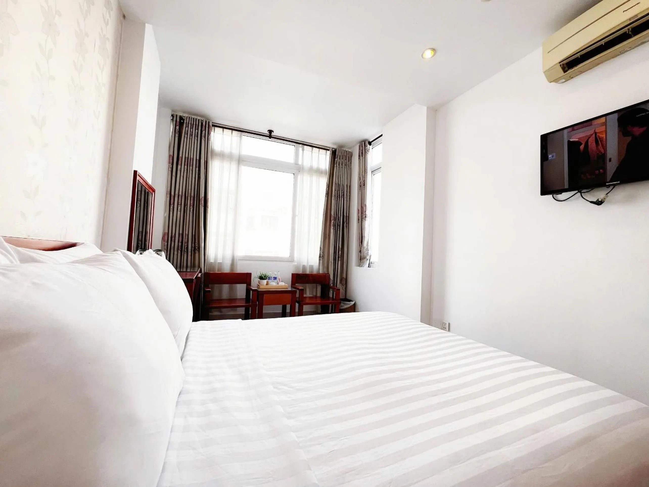 Bed in SaiGon Europe Hotel