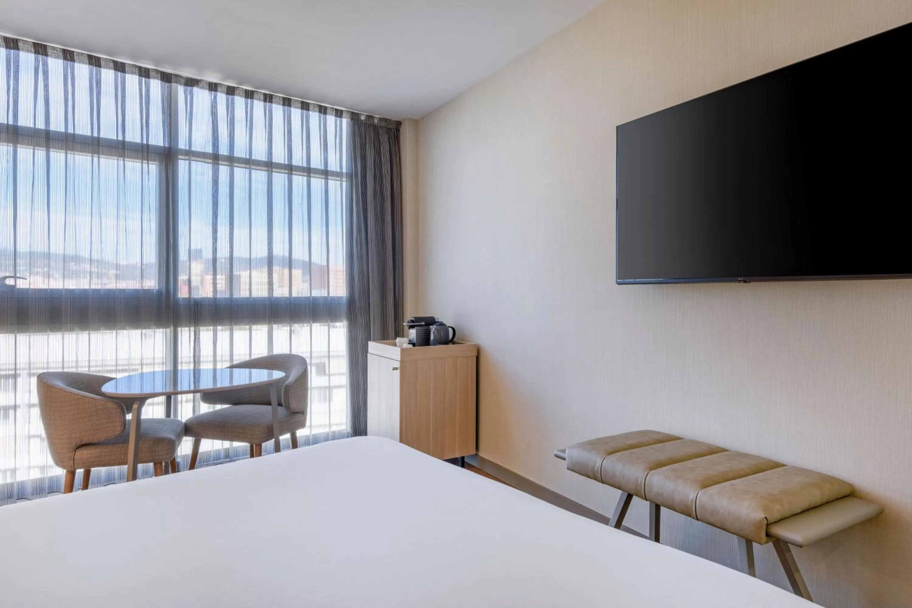 Photo of the whole room, Bed in AC Hotel Som by Marriott