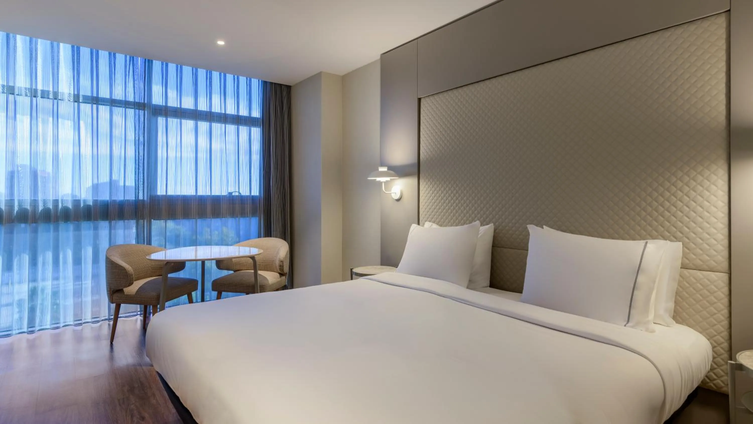 Photo of the whole room, Bed in AC Hotel Som by Marriott