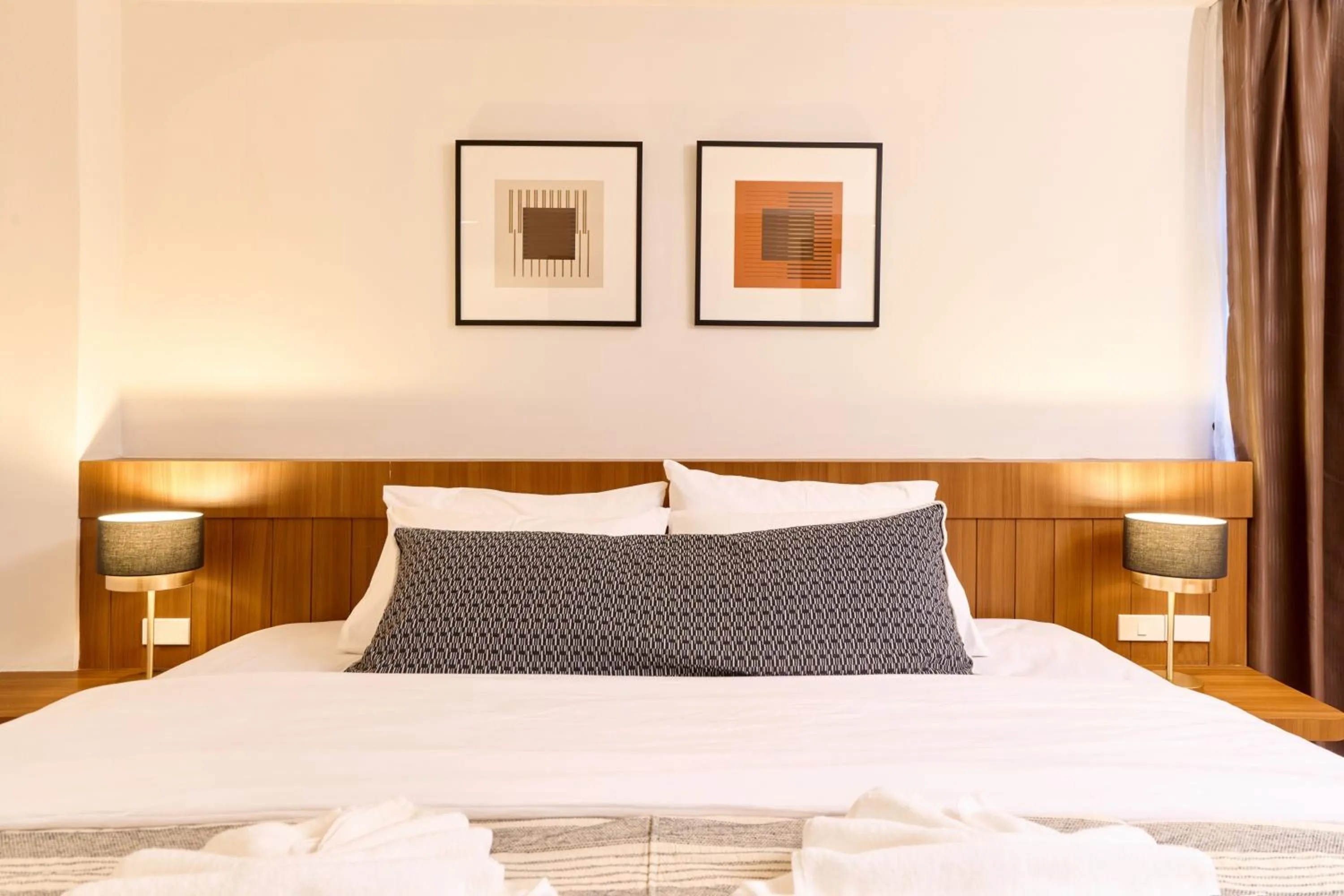 Bed in Be Phrasingh Hotel Chiang Mai