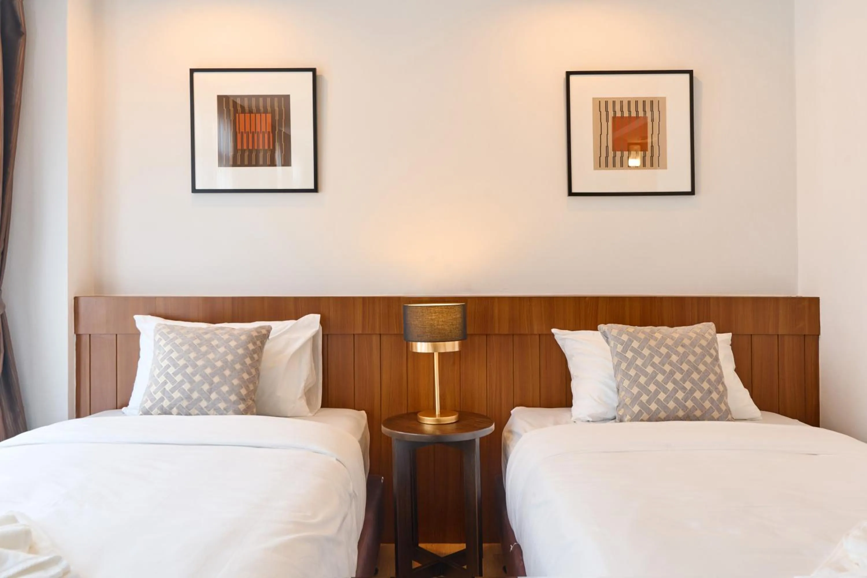 Bed in Be Phrasingh Hotel Chiang Mai