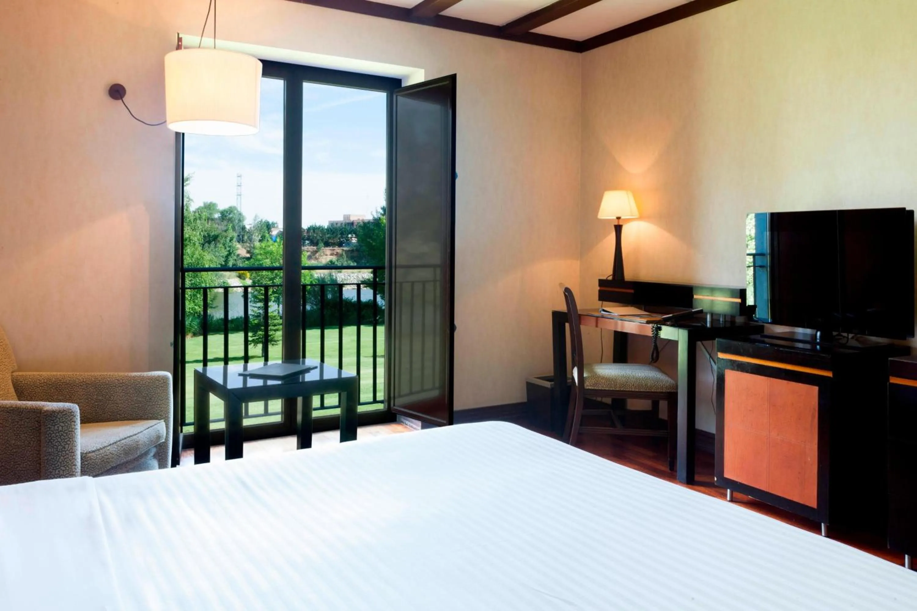 Photo of the whole room, Bed in AC Hotel Palacio de Santa Ana by Marriott