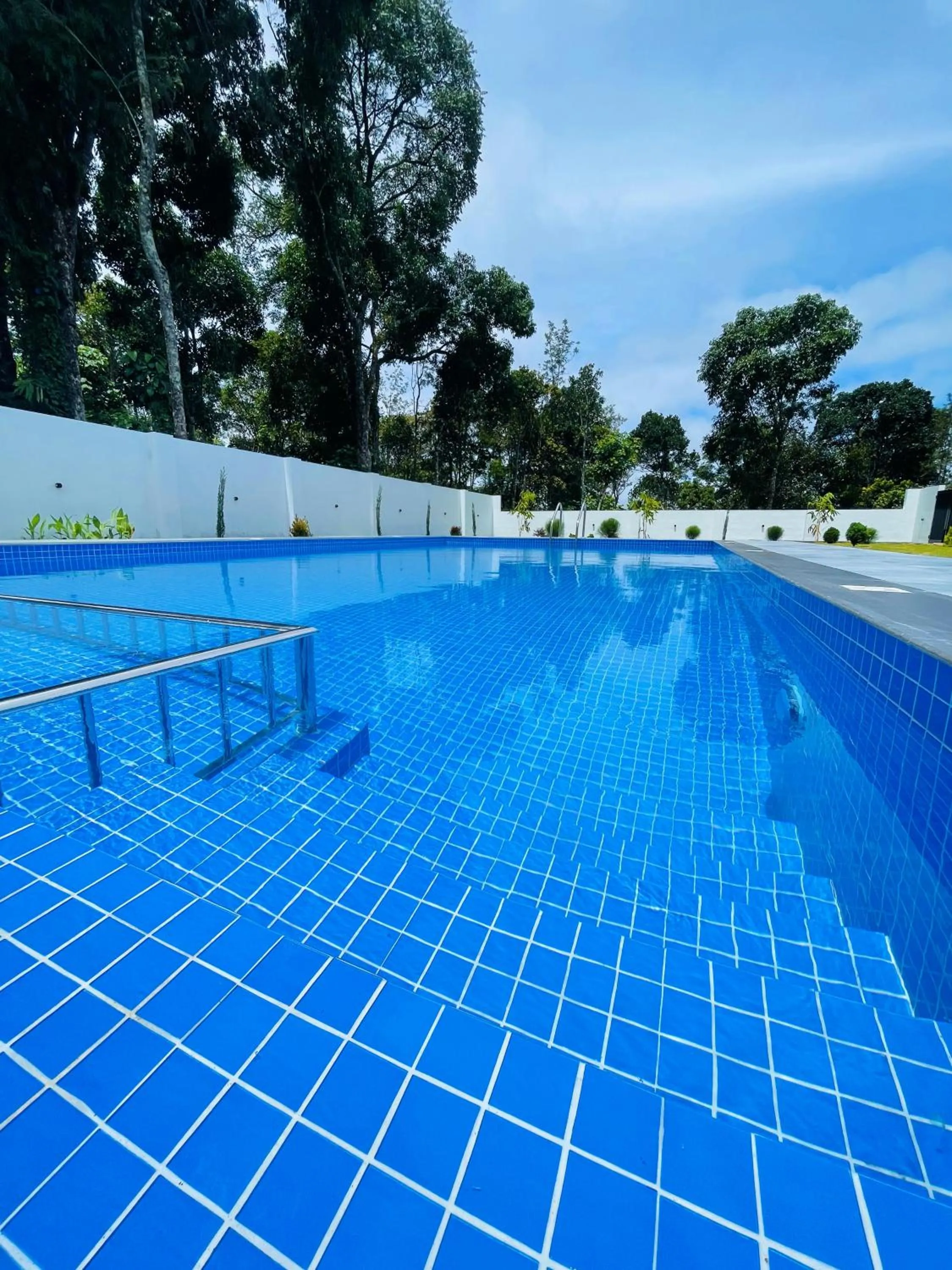 Swimming pool in The Windy Mist Resort Munnar