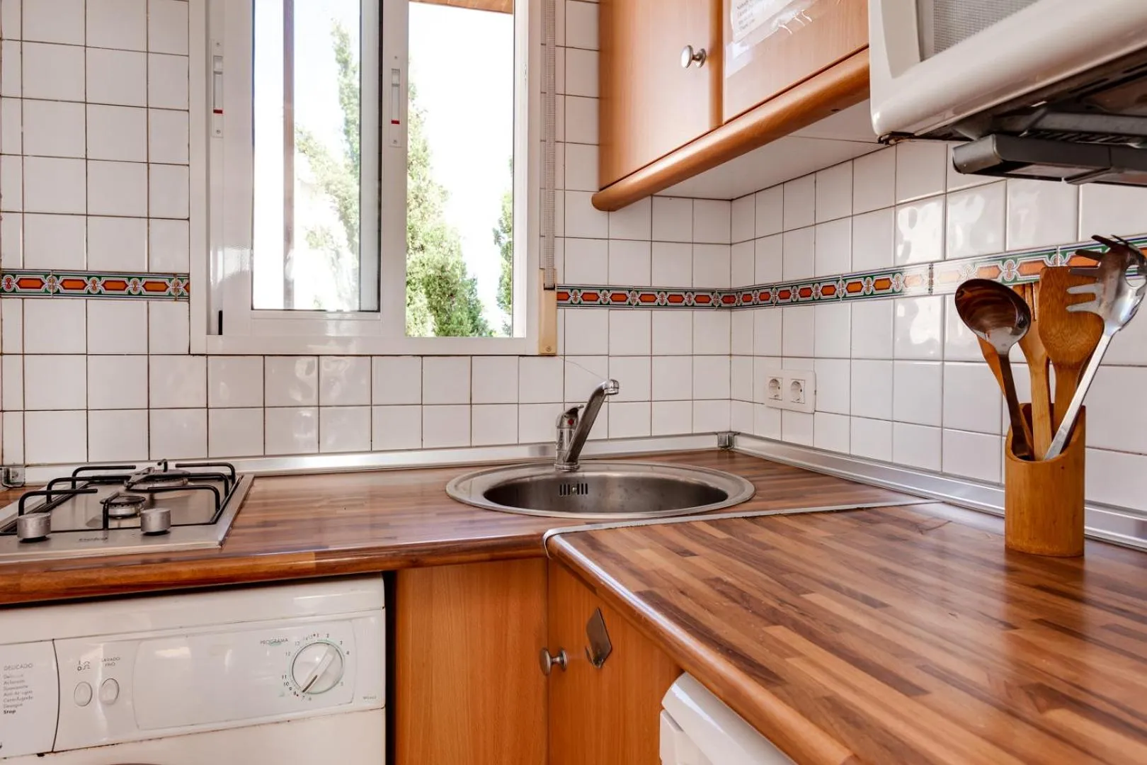 Kitchen or kitchenette in Laguna Salada Hotel Apartamento