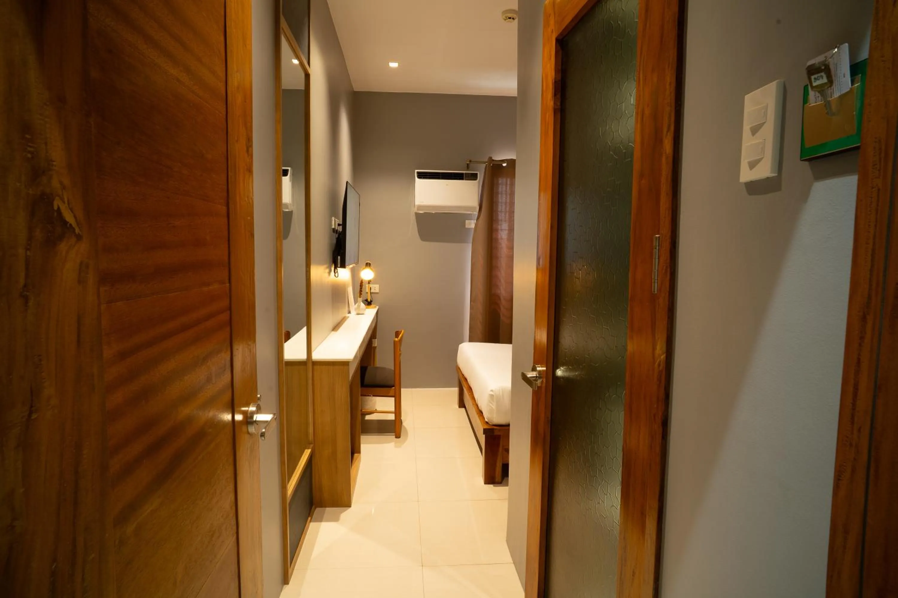 Bedroom in Madonna Hometel and Suites New Pandan