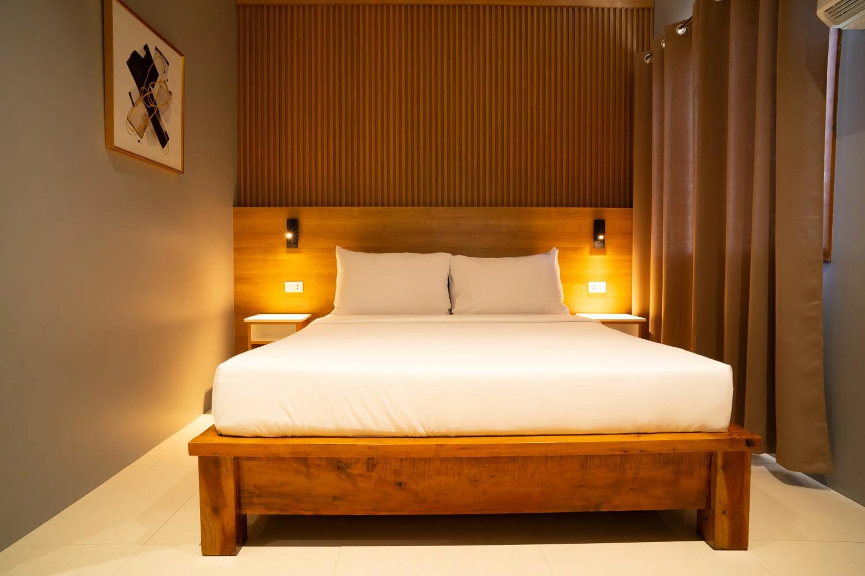 Bed in Madonna Hometel and Suites New Pandan