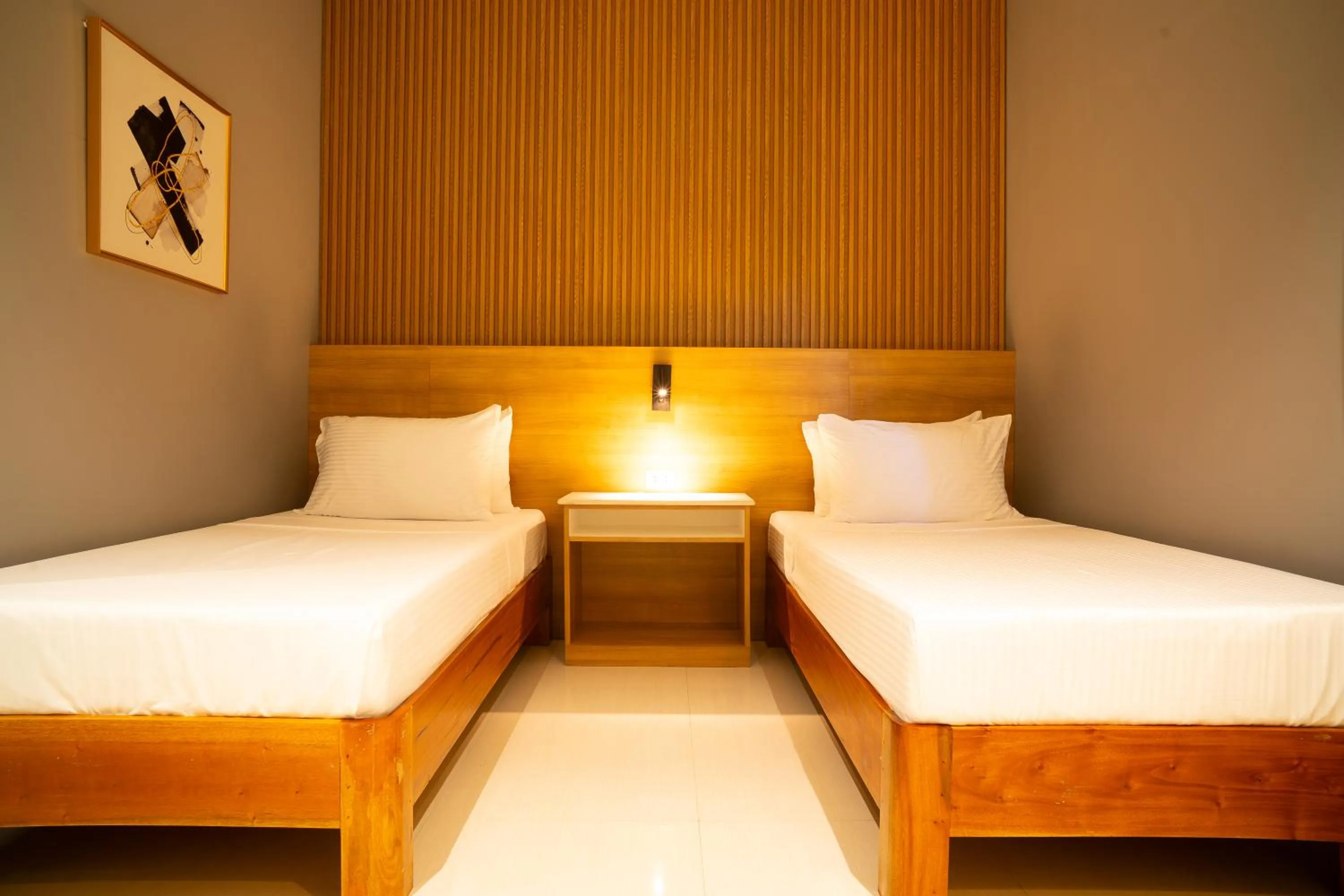 Bed in Madonna Hometel and Suites New Pandan