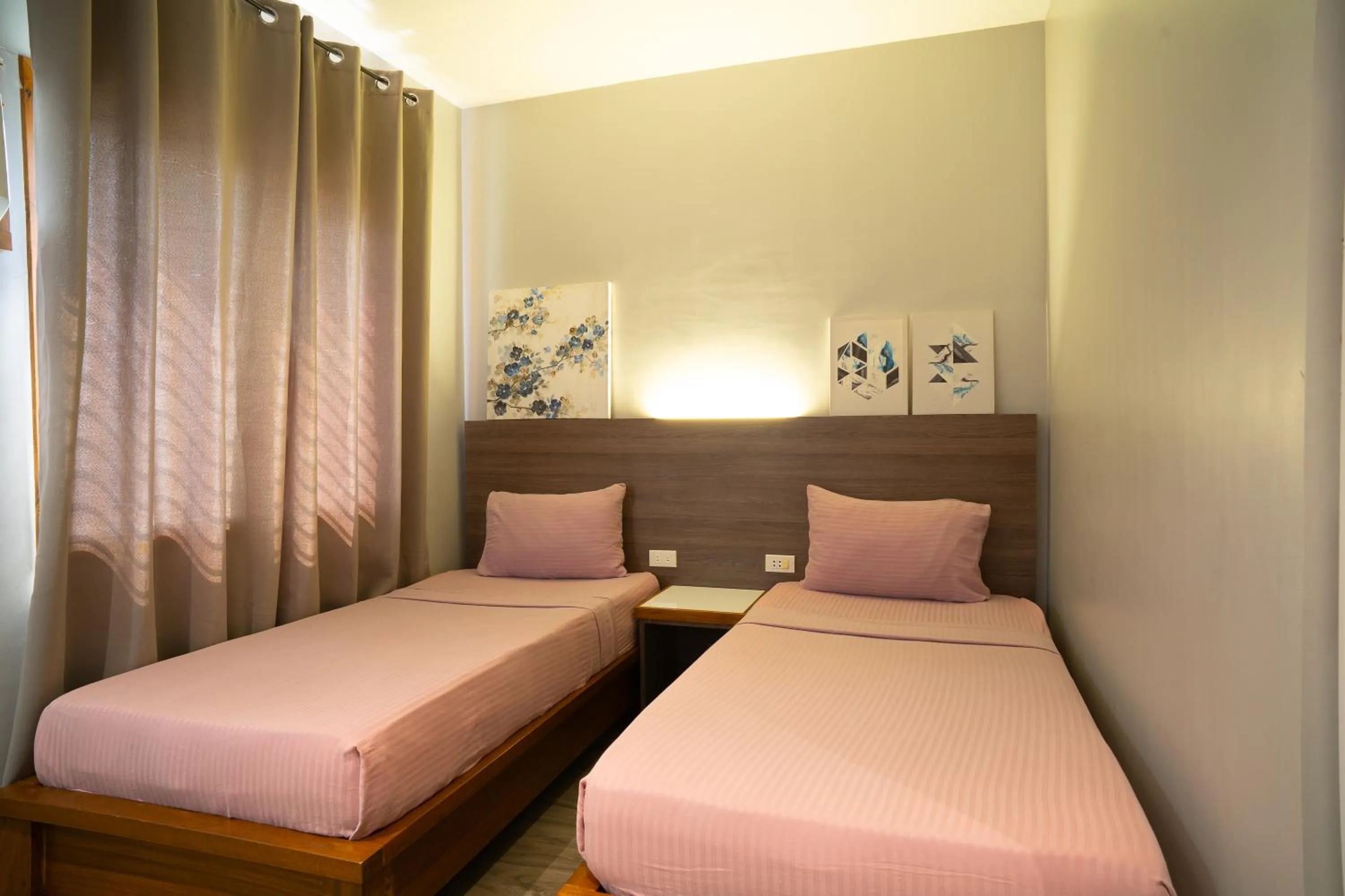 Bed in Madonna Hometel and Suites New Pandan