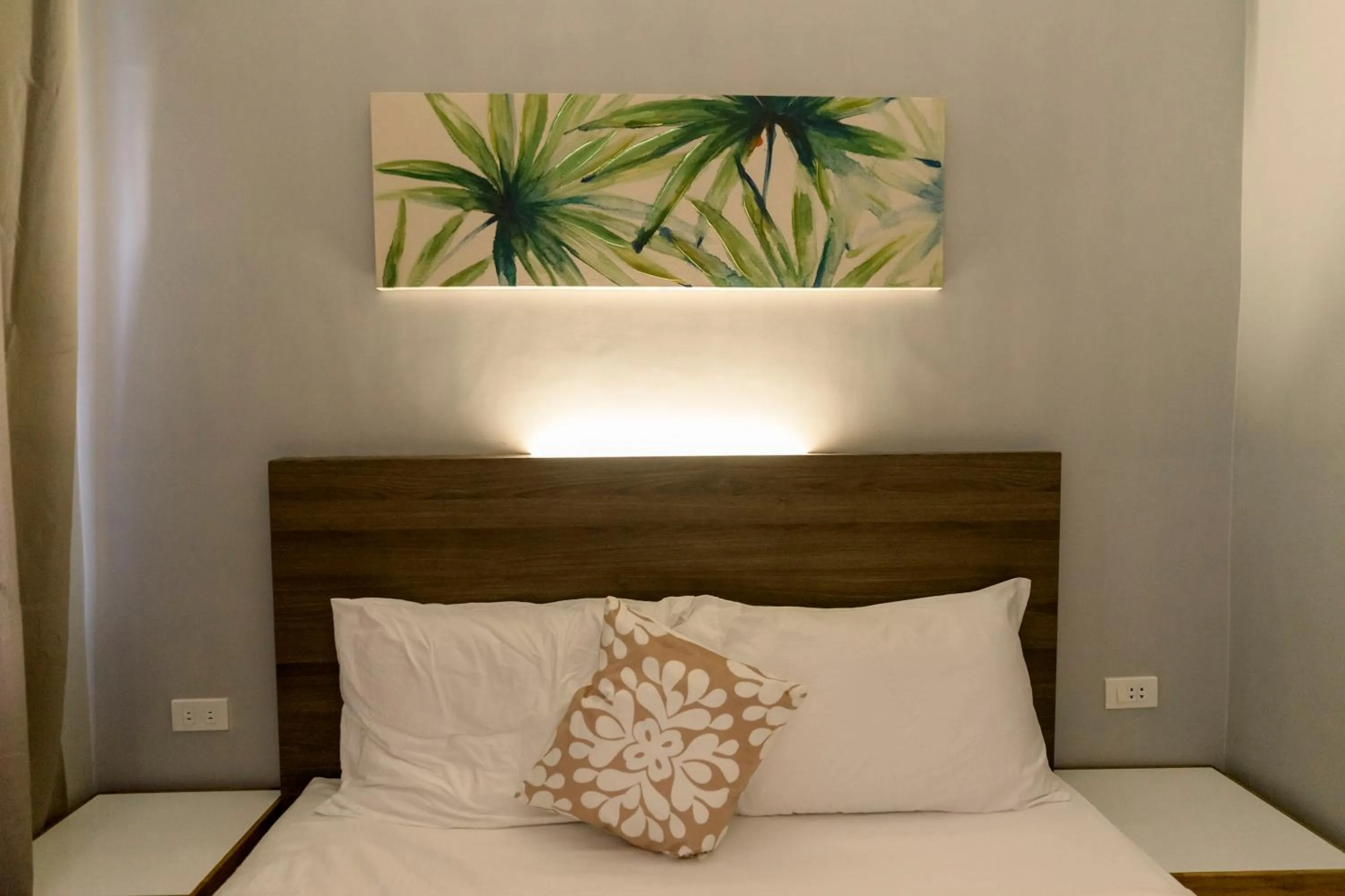 Bed in Madonna Hometel and Suites New Pandan