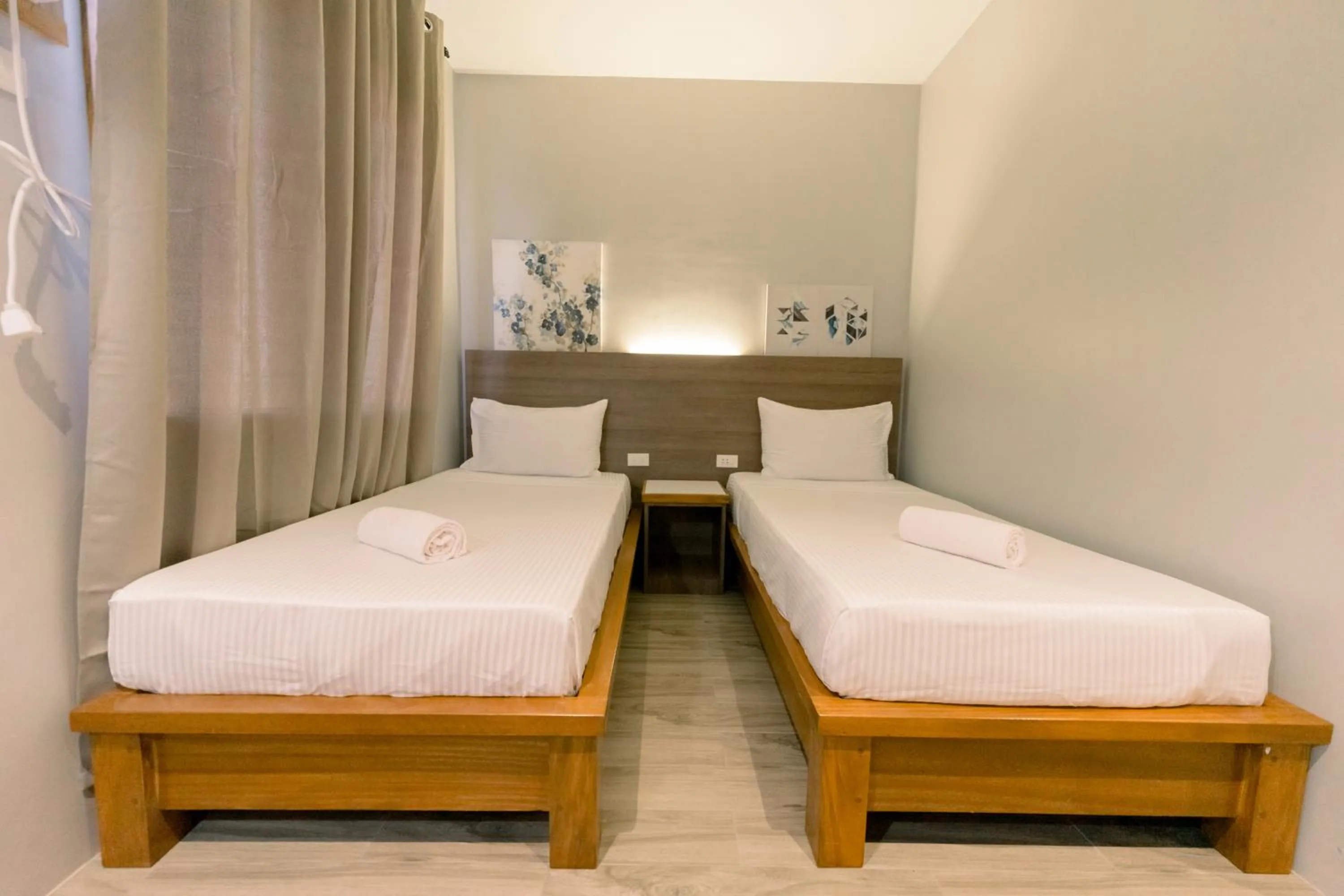 Bed in Madonna Hometel and Suites New Pandan