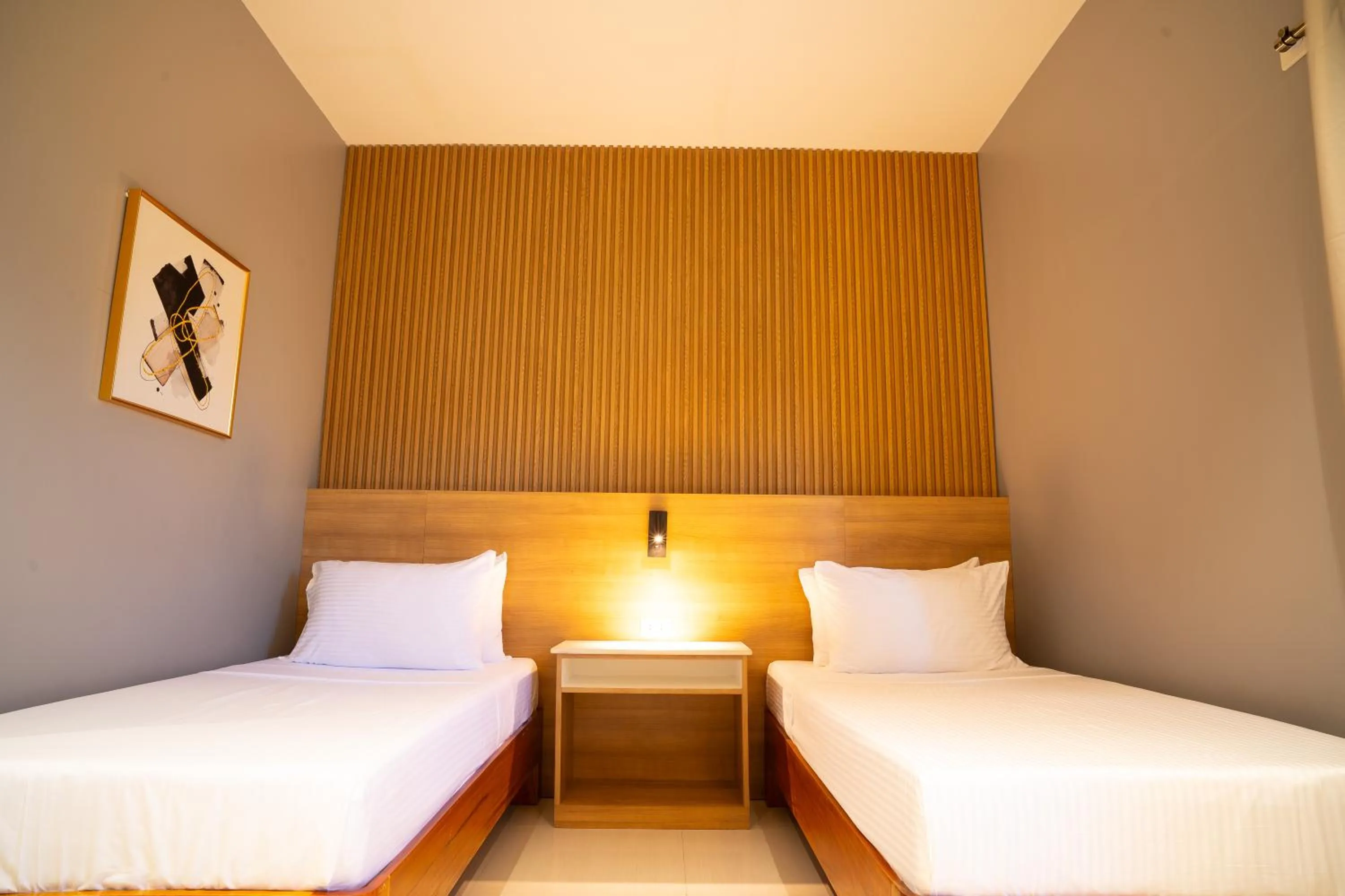 Bed in Madonna Hometel and Suites New Pandan