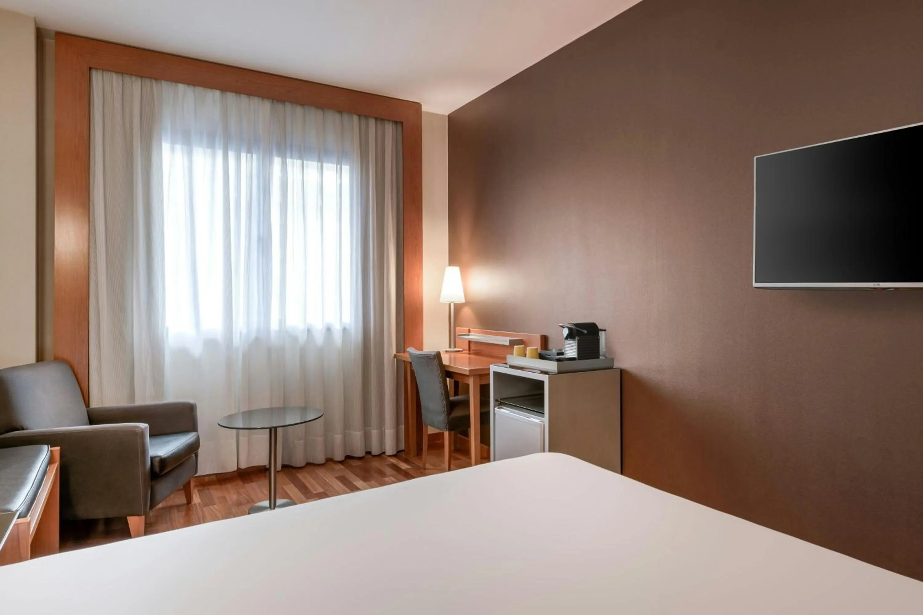 Photo of the whole room, Bed in AC Hotel León San Antonio by Marriott