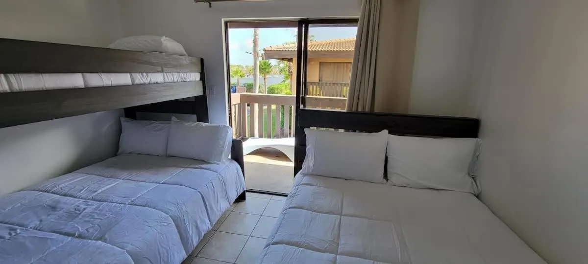 Bed in Tiki Condo 261