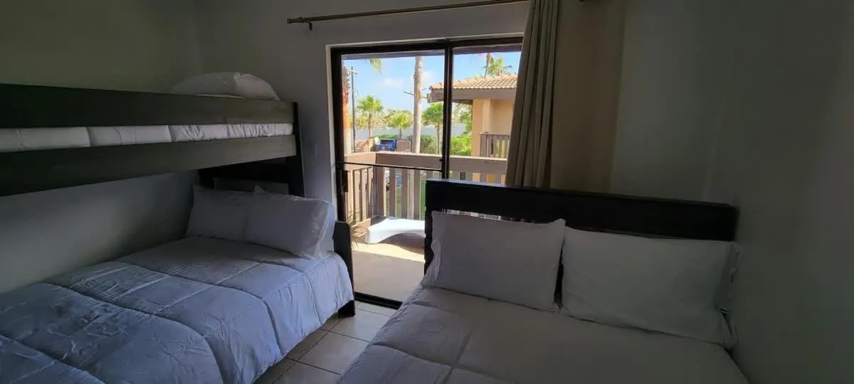 Bed in Tiki Condo 261