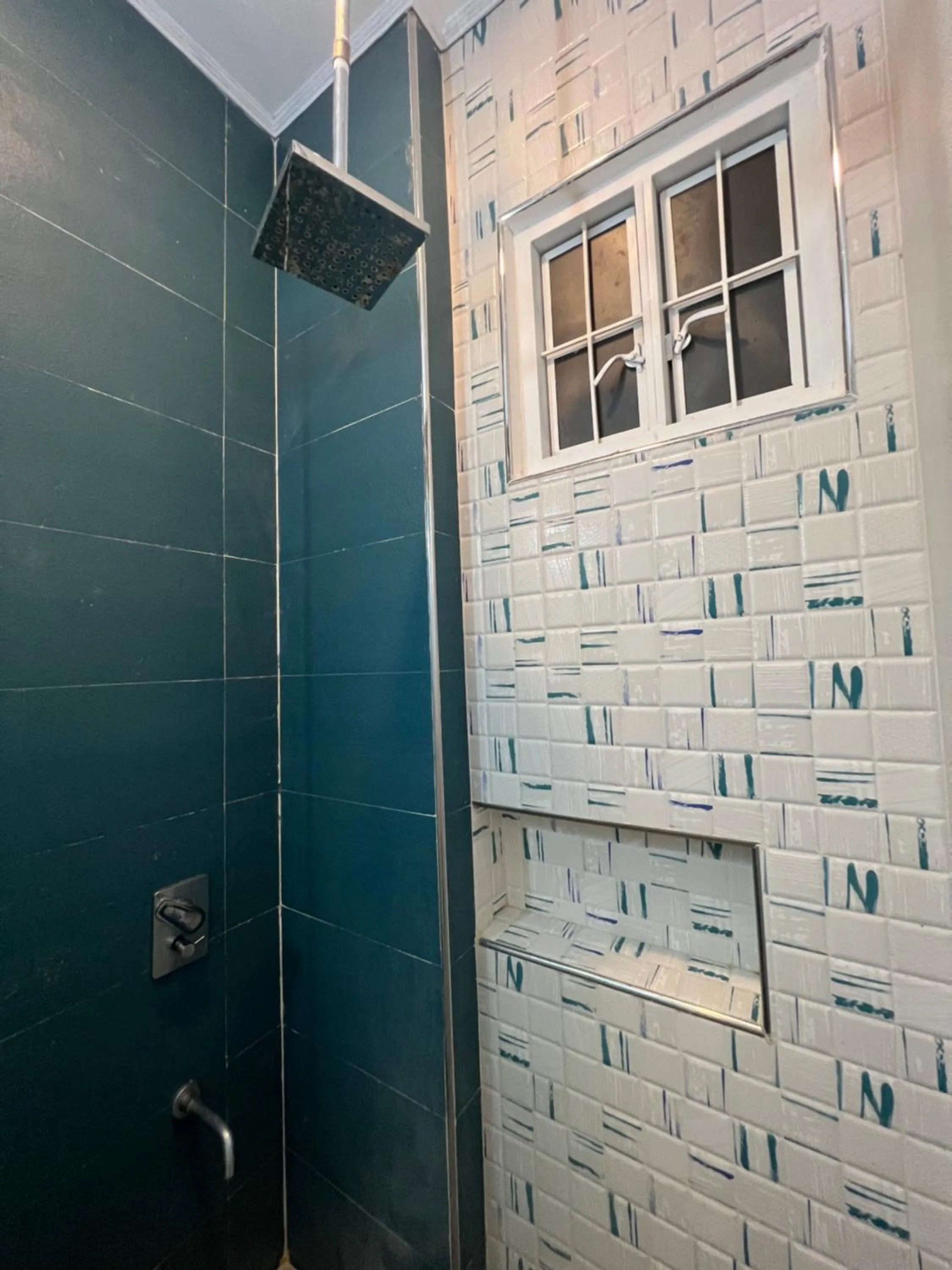 Shower in Dampa Poolside Events & Accommodation