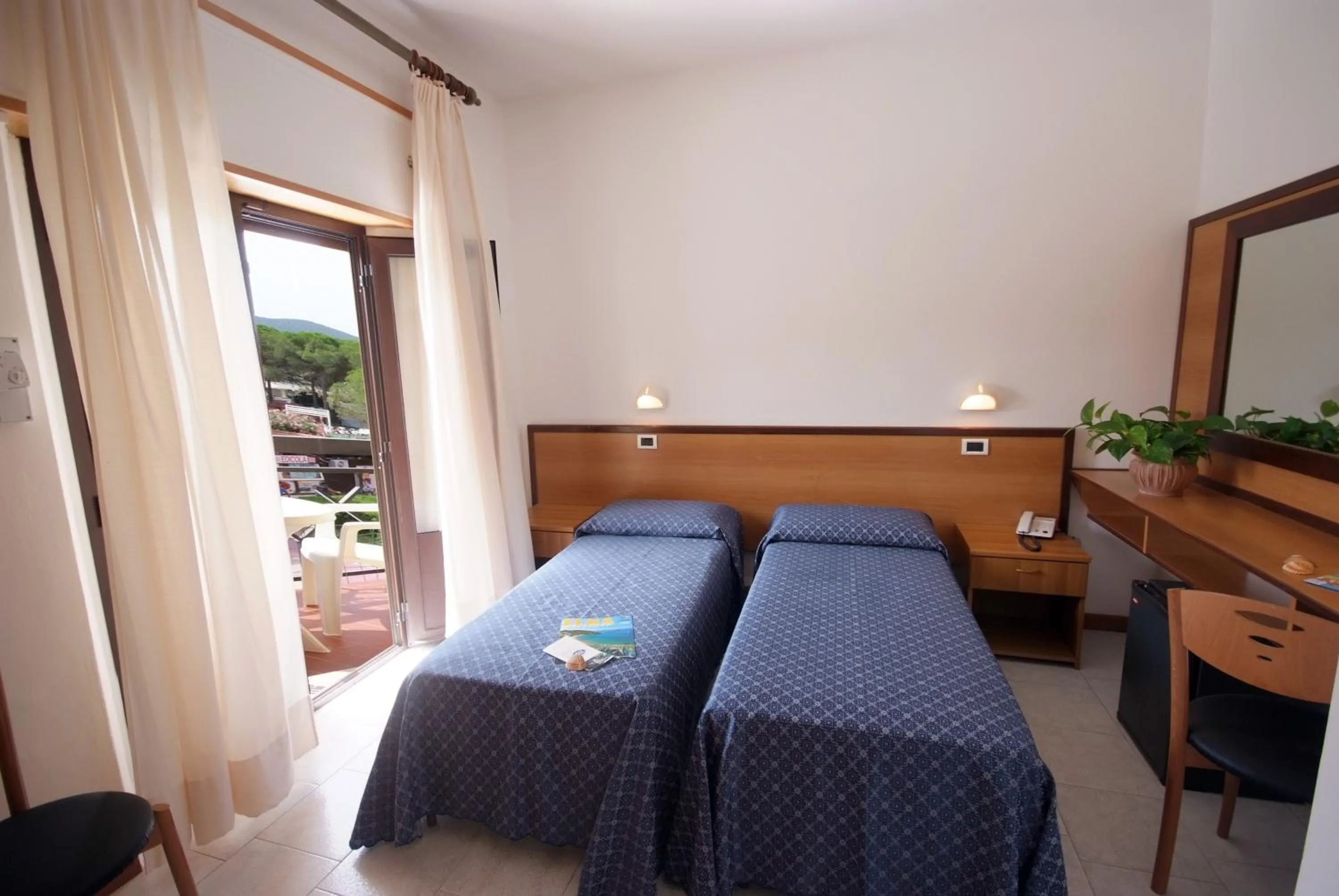 Photo of the whole room, Bed in Hotel Lilly