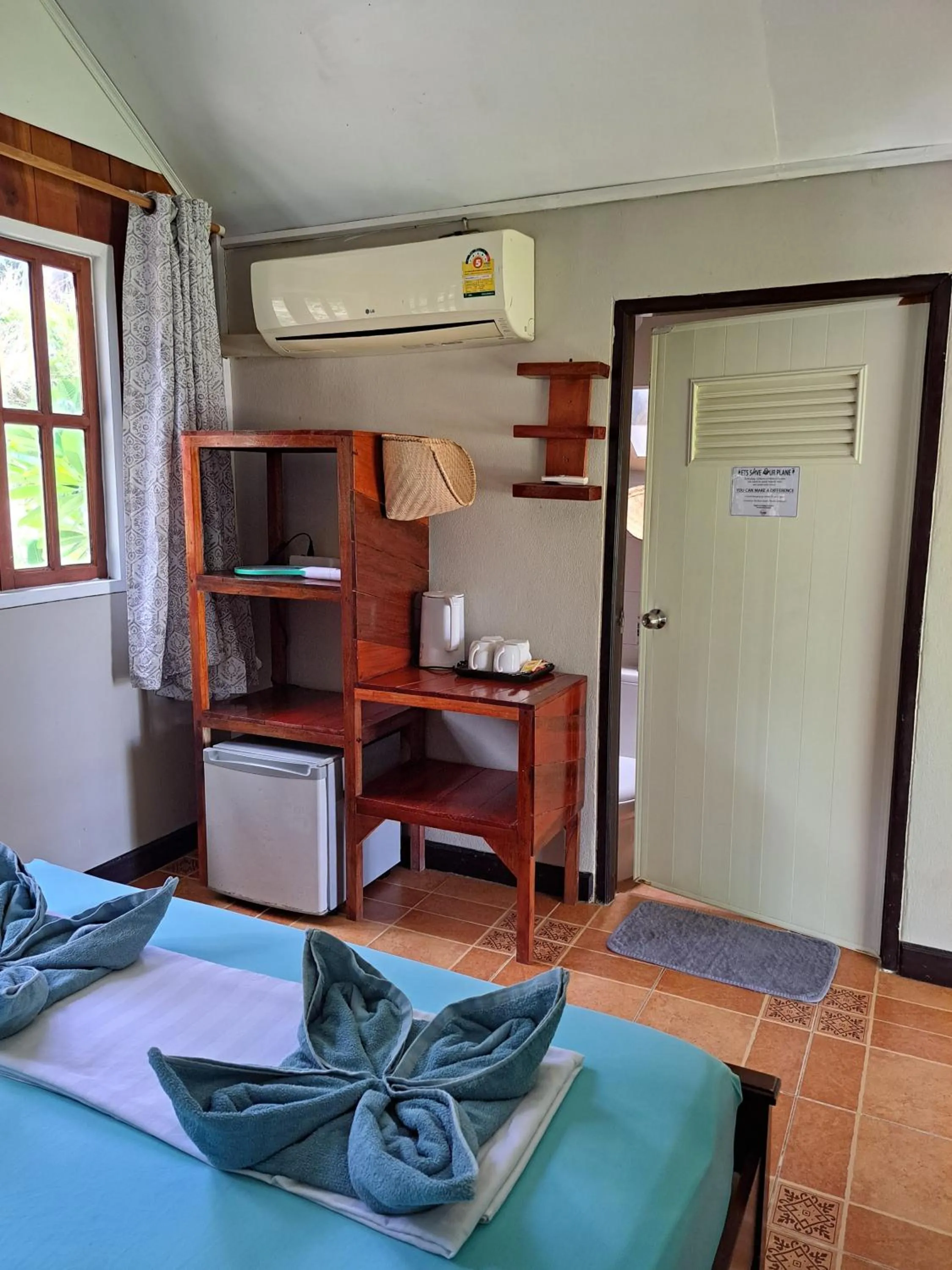 Photo of the whole room, Bed in Sense Asia