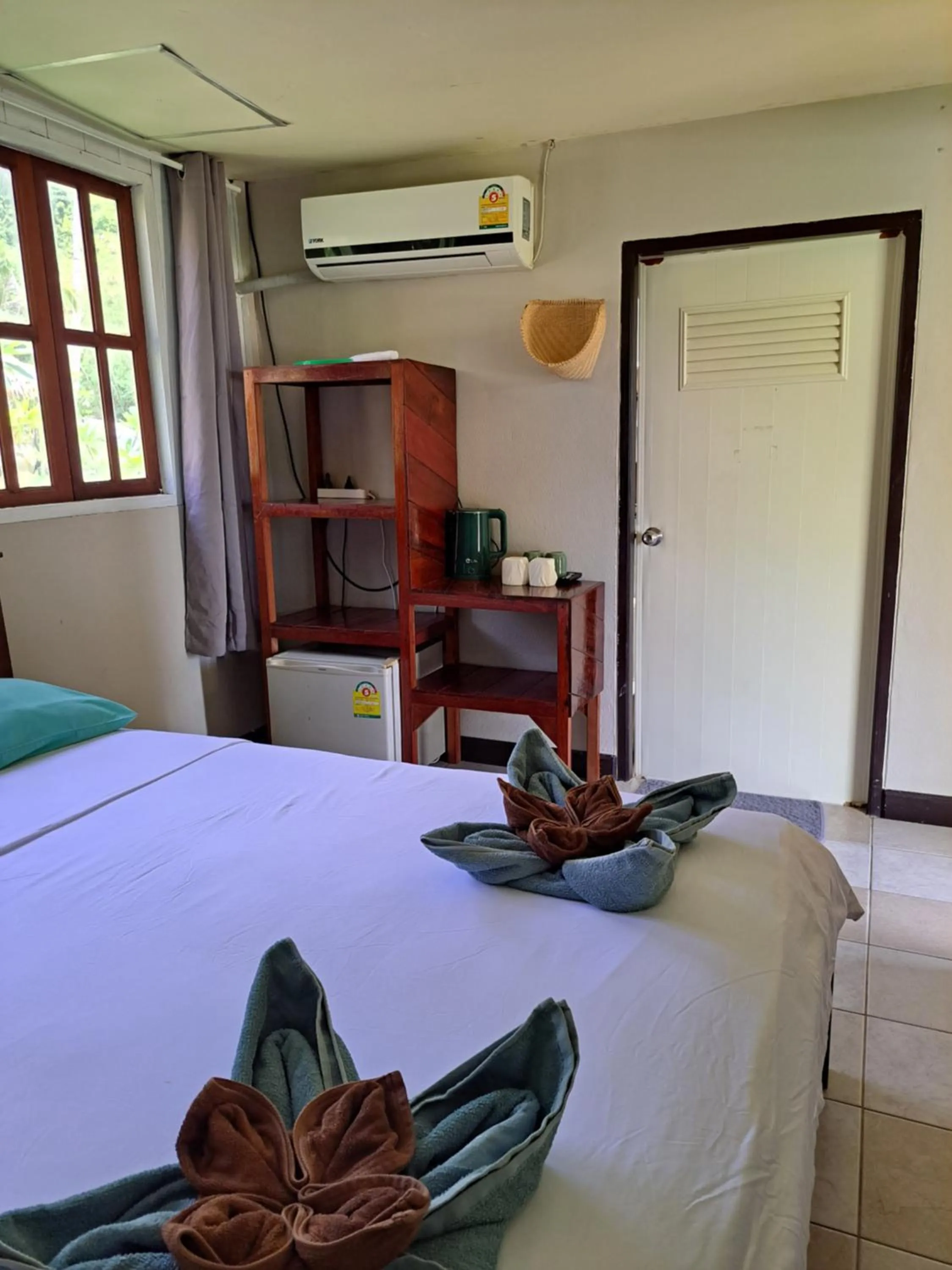 Photo of the whole room, Bed in Sense Asia