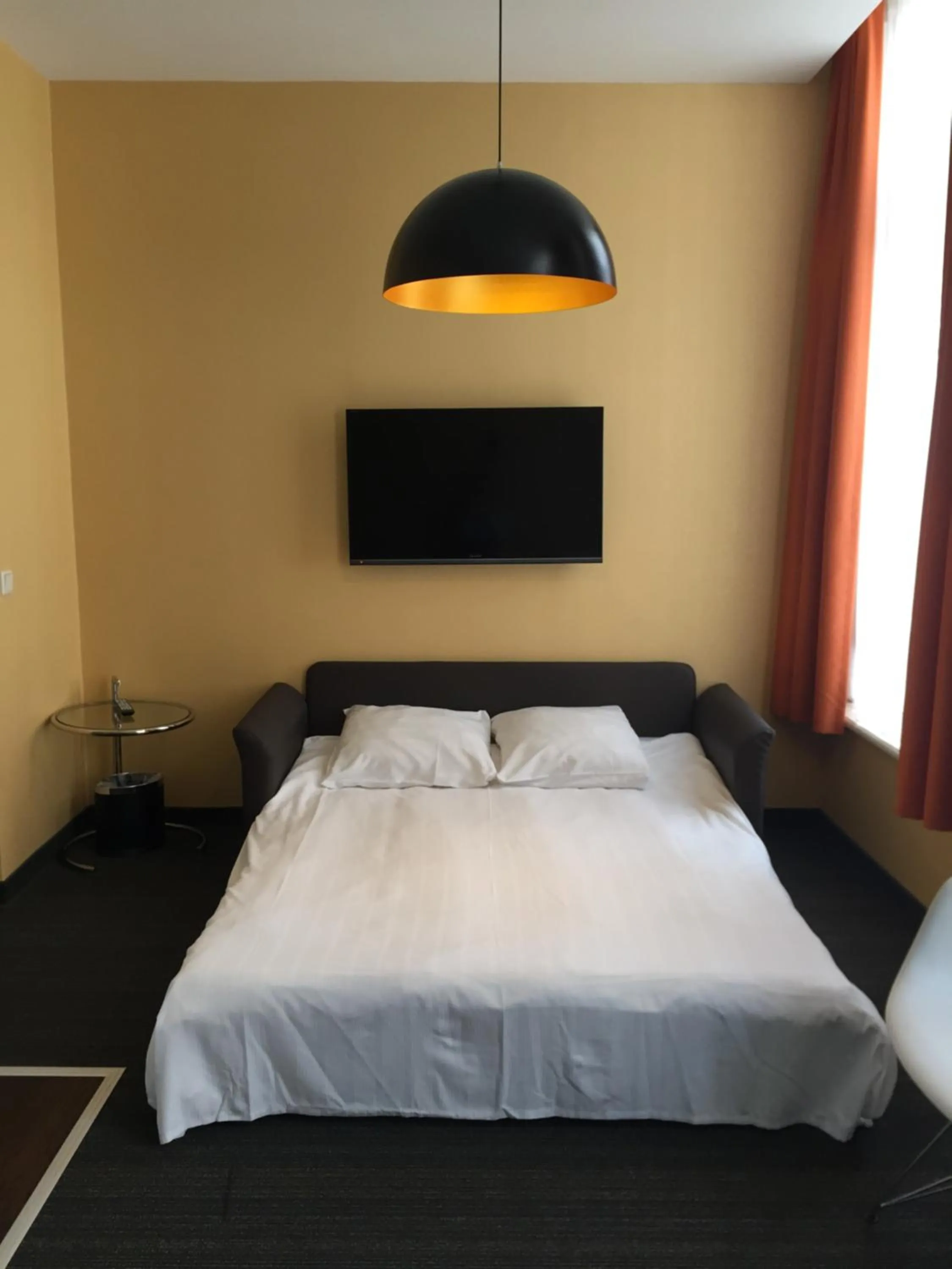 Bed in Golden Mansion Apartment Hotel