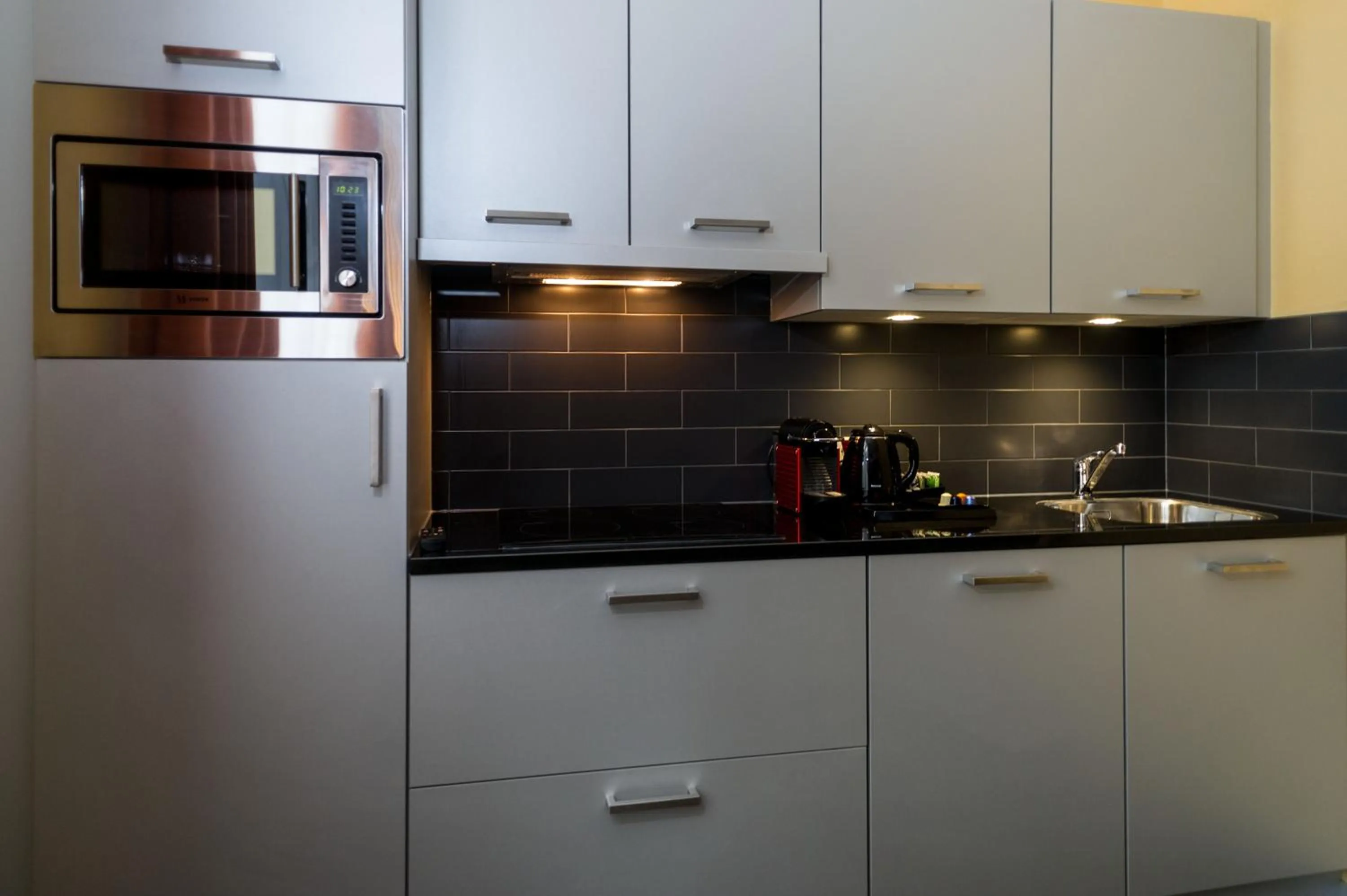 Kitchen or kitchenette in Golden Mansion Apartment Hotel