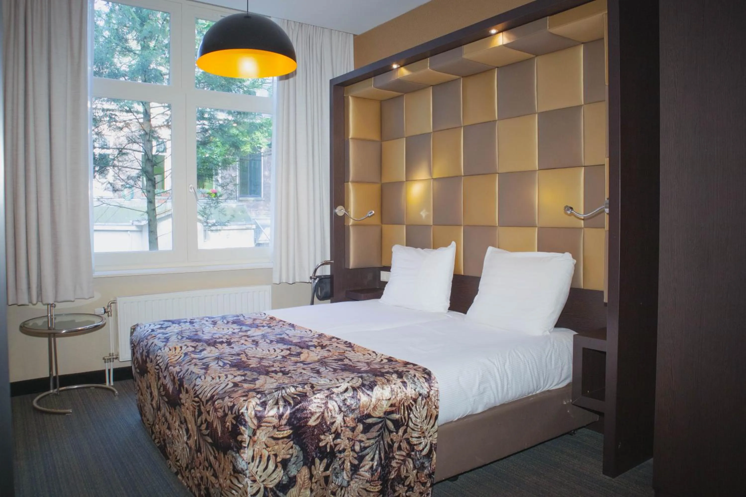 Bed in Golden Mansion Apartment Hotel