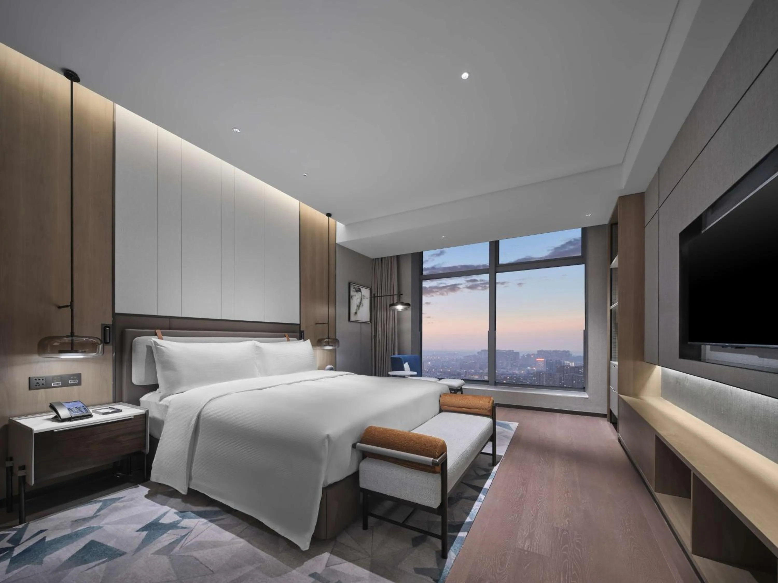 Bed in Doubletree By Hilton Rugao