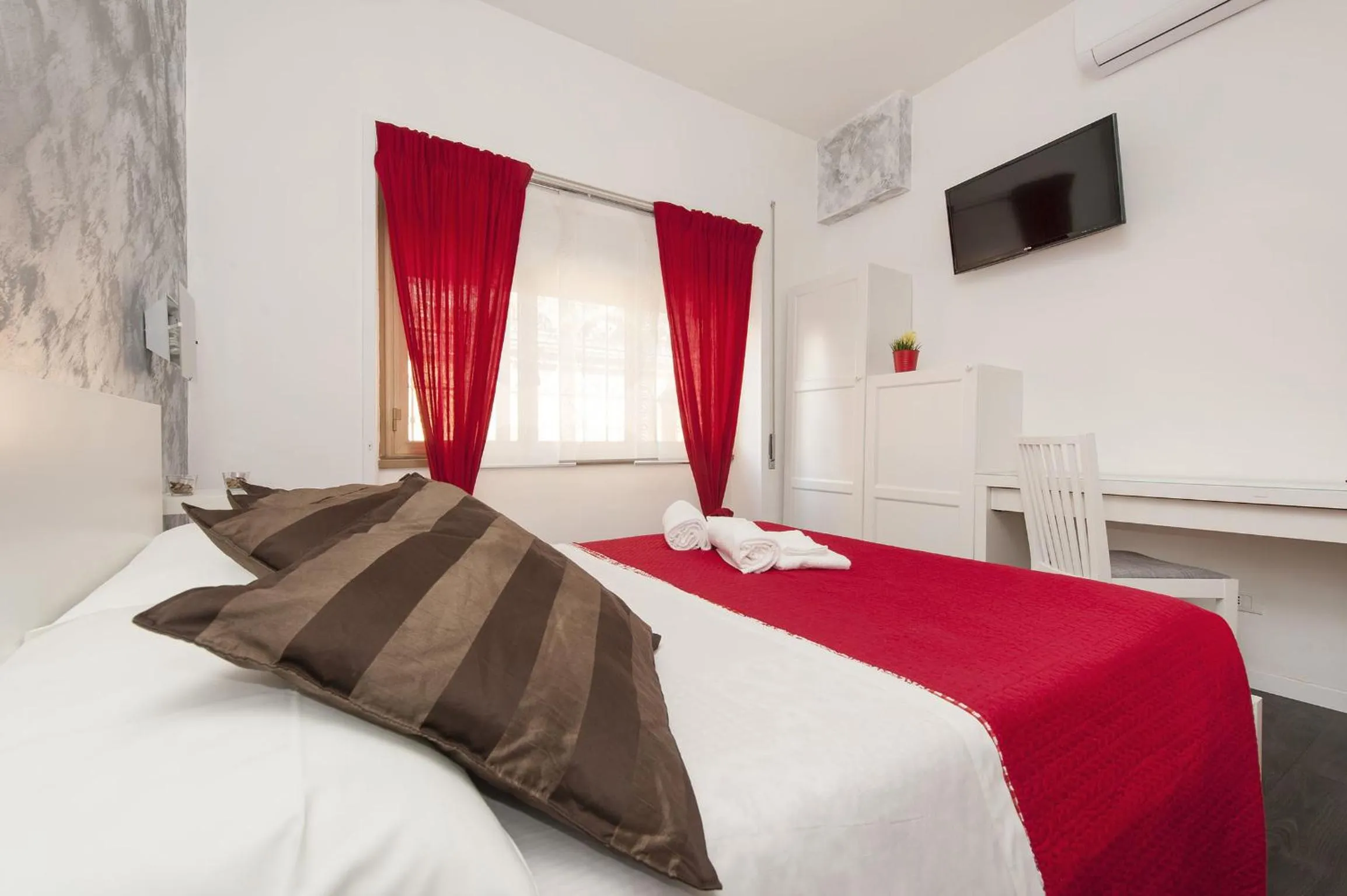 Photo of the whole room, Bed in De Guestibus