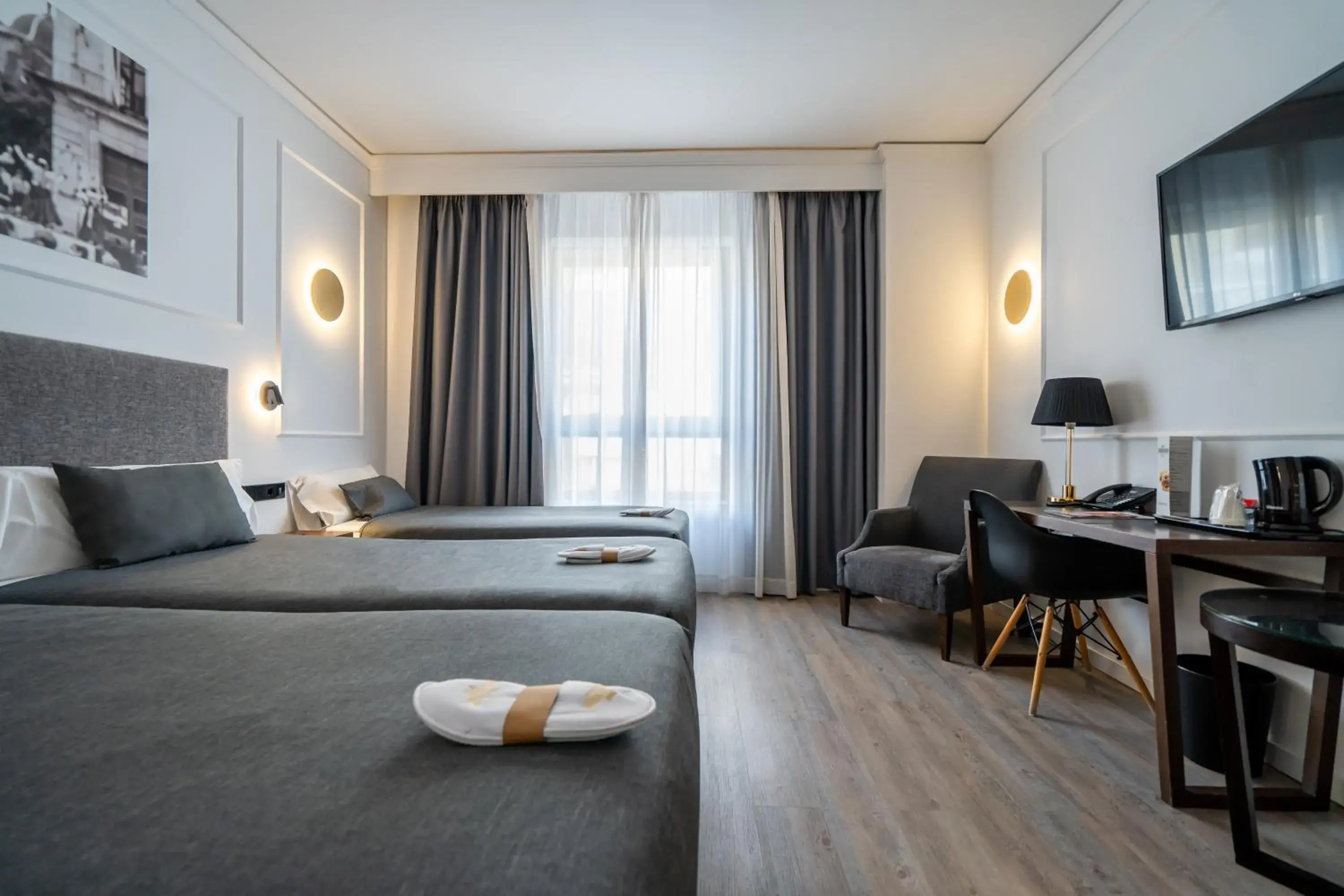 Triple Room in Hotel Conqueridor Triple Room in Hotel Conqueridor