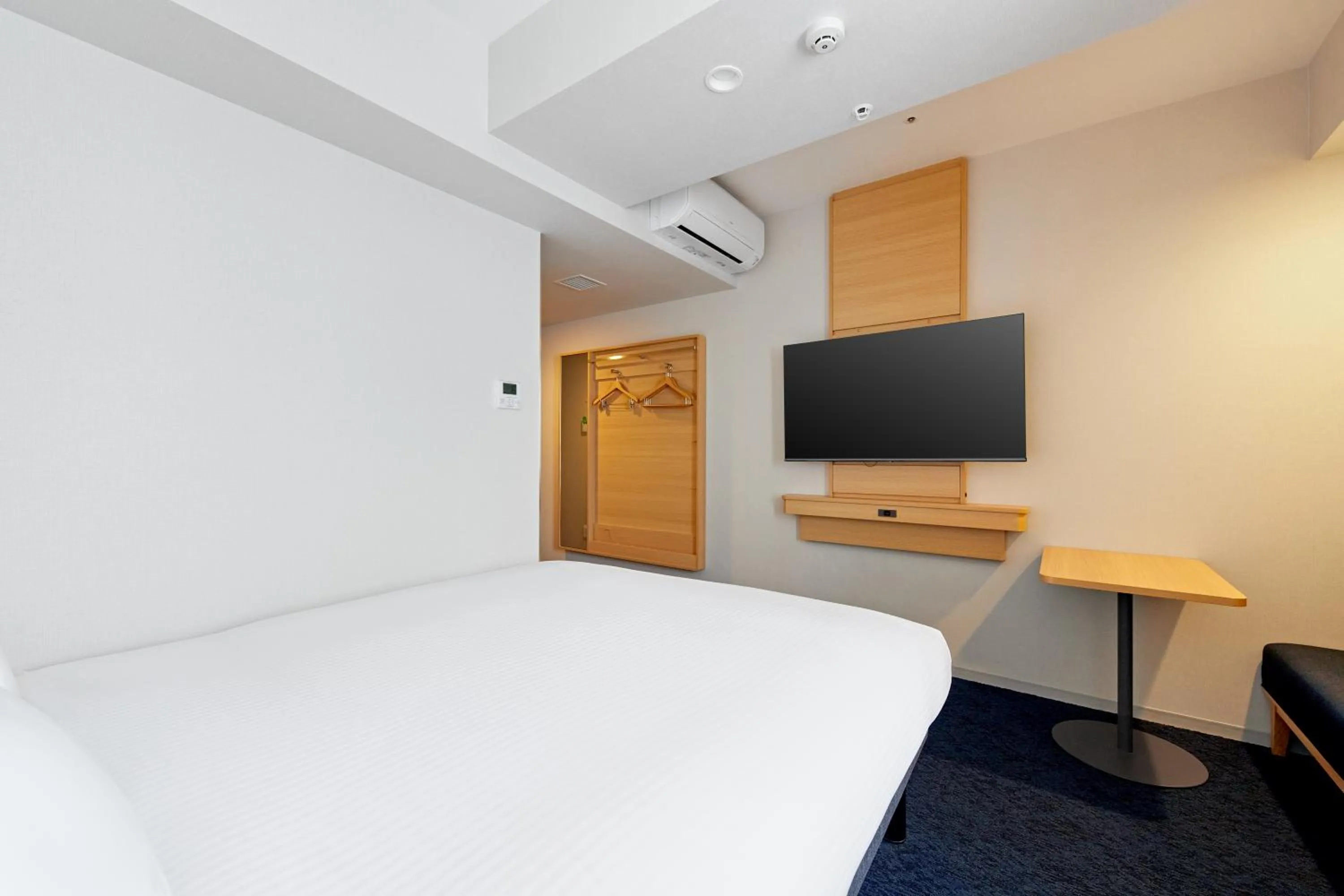 Photo of the whole room, Bed in Sotetsu Fresa Inn Yodoyabashi