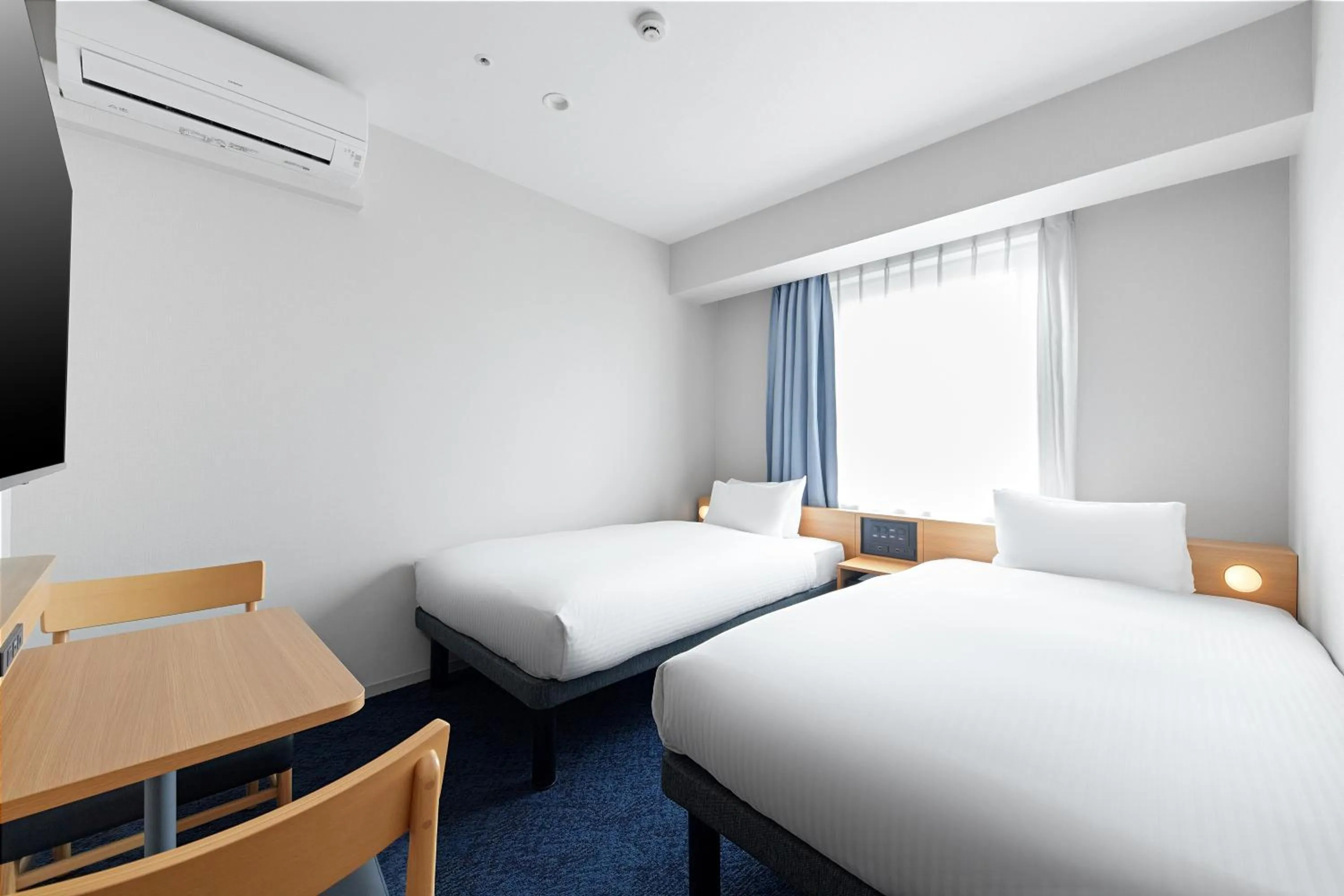 Photo of the whole room, Bed in Sotetsu Fresa Inn Yodoyabashi