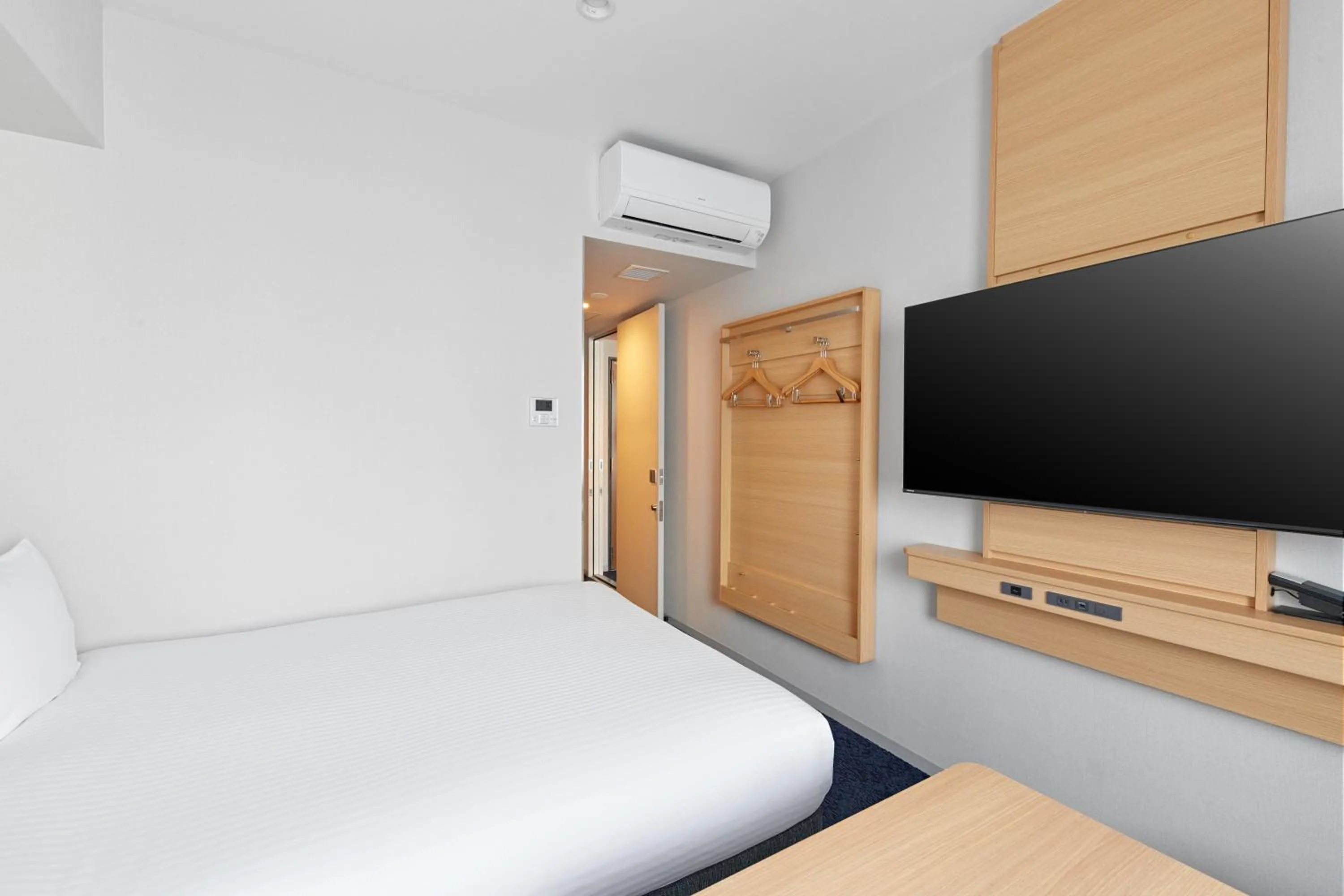 Photo of the whole room, Bed in Sotetsu Fresa Inn Yodoyabashi