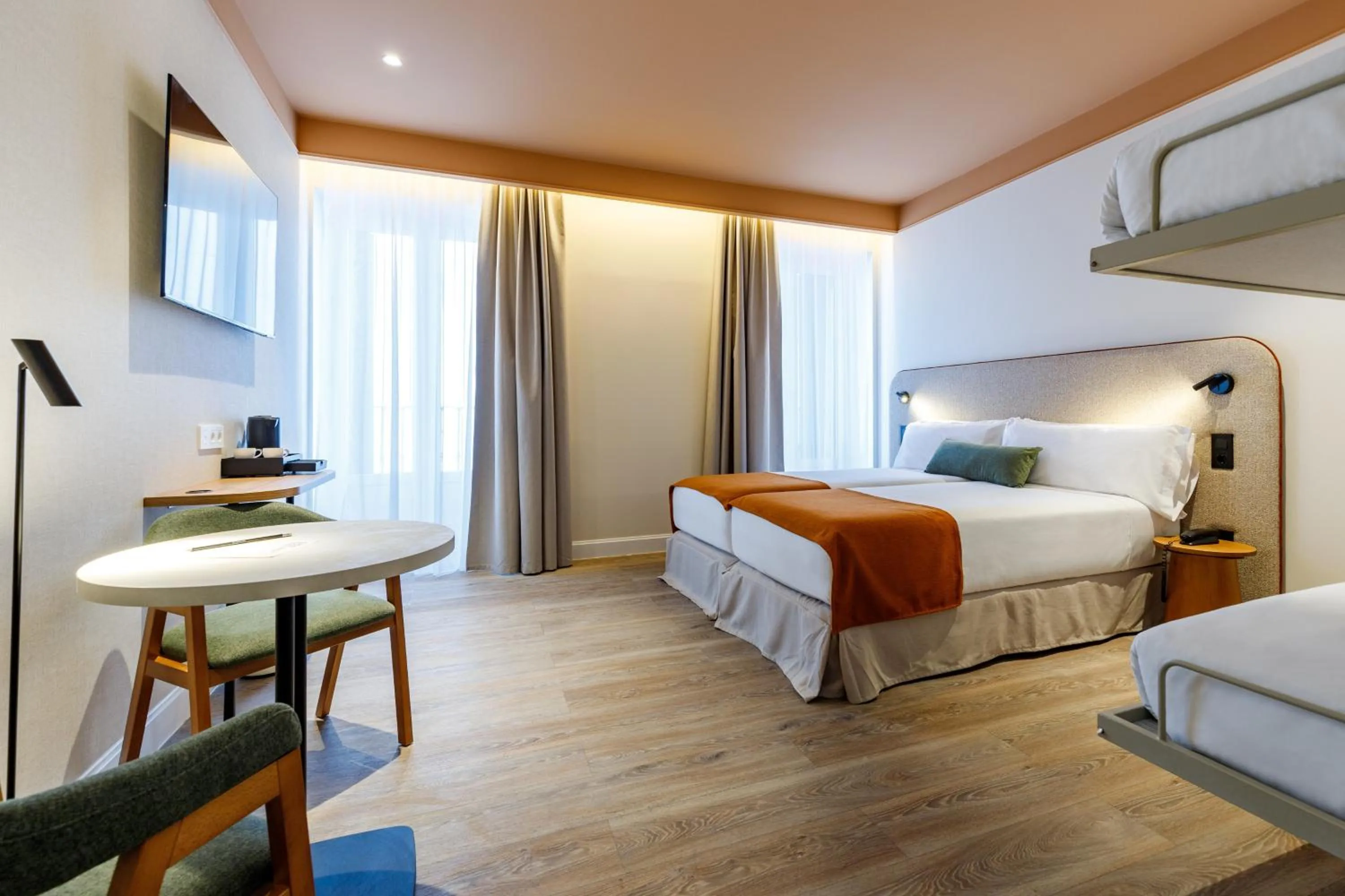 Bed in Petit Palace Puerta del Sol