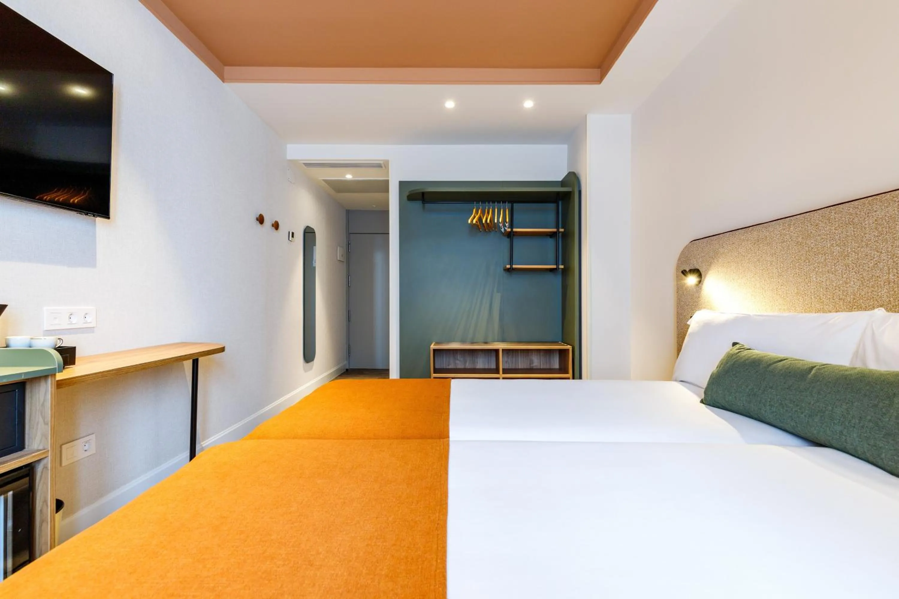 Bed in Petit Palace Puerta del Sol