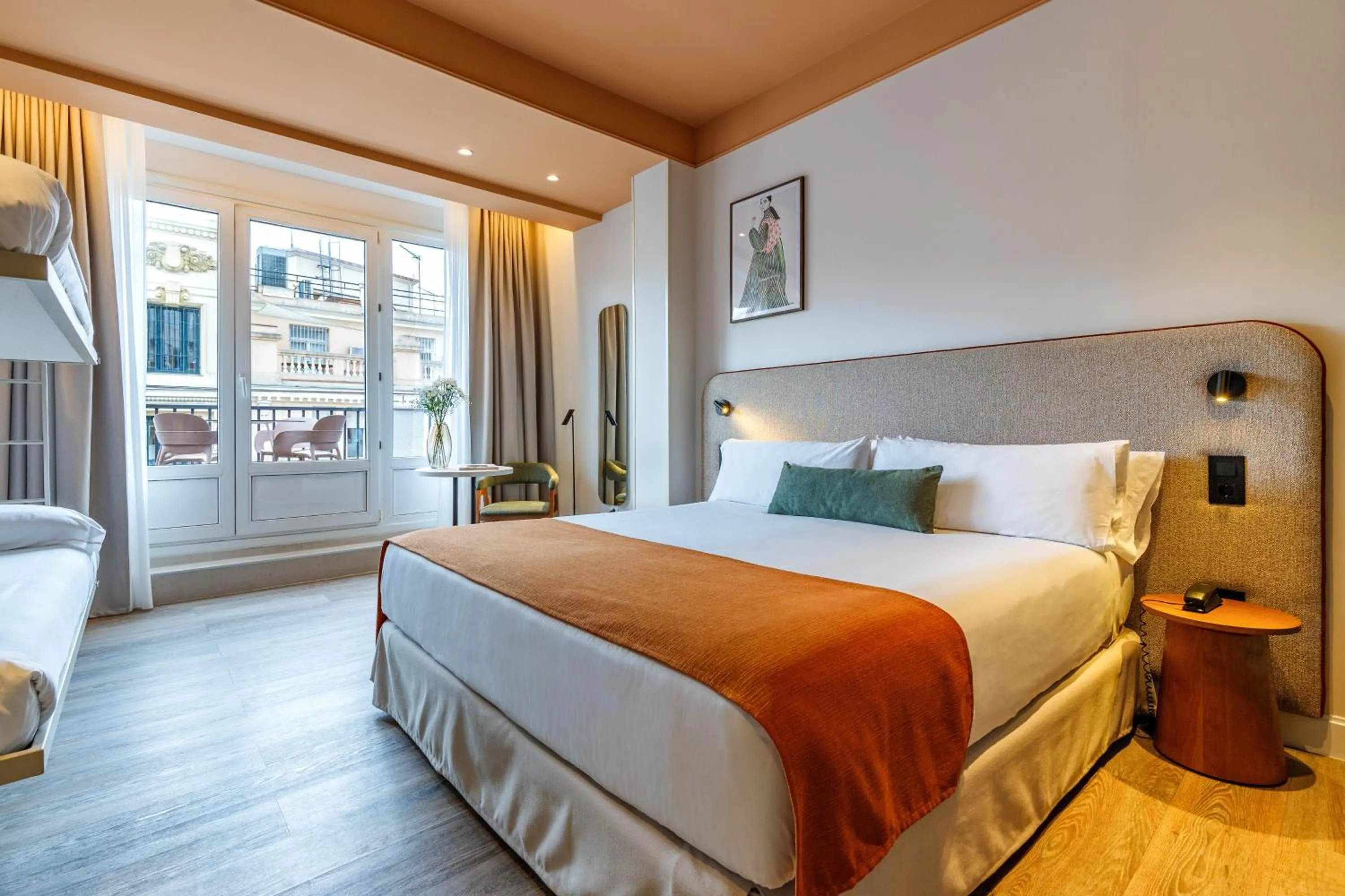 Bed in Petit Palace Puerta del Sol