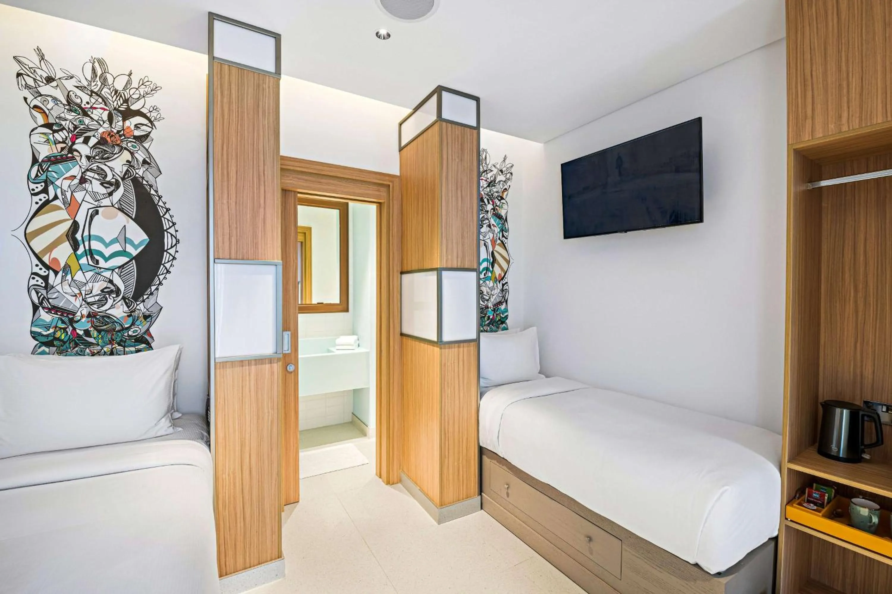 Bed in Fuwairit Kite Beach, Tapestry Collection By Hilton