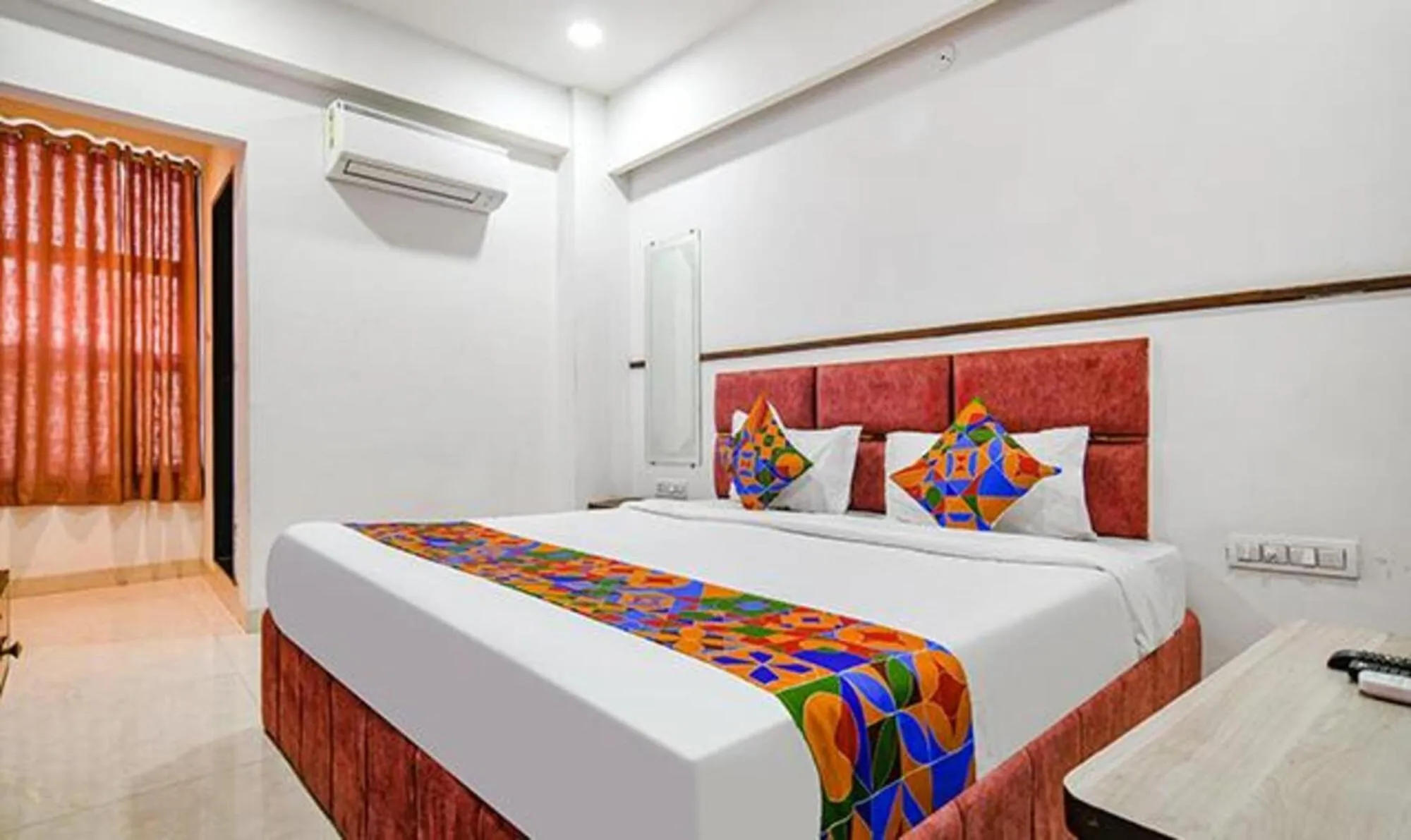 Bed in FabHotel Elite Residency