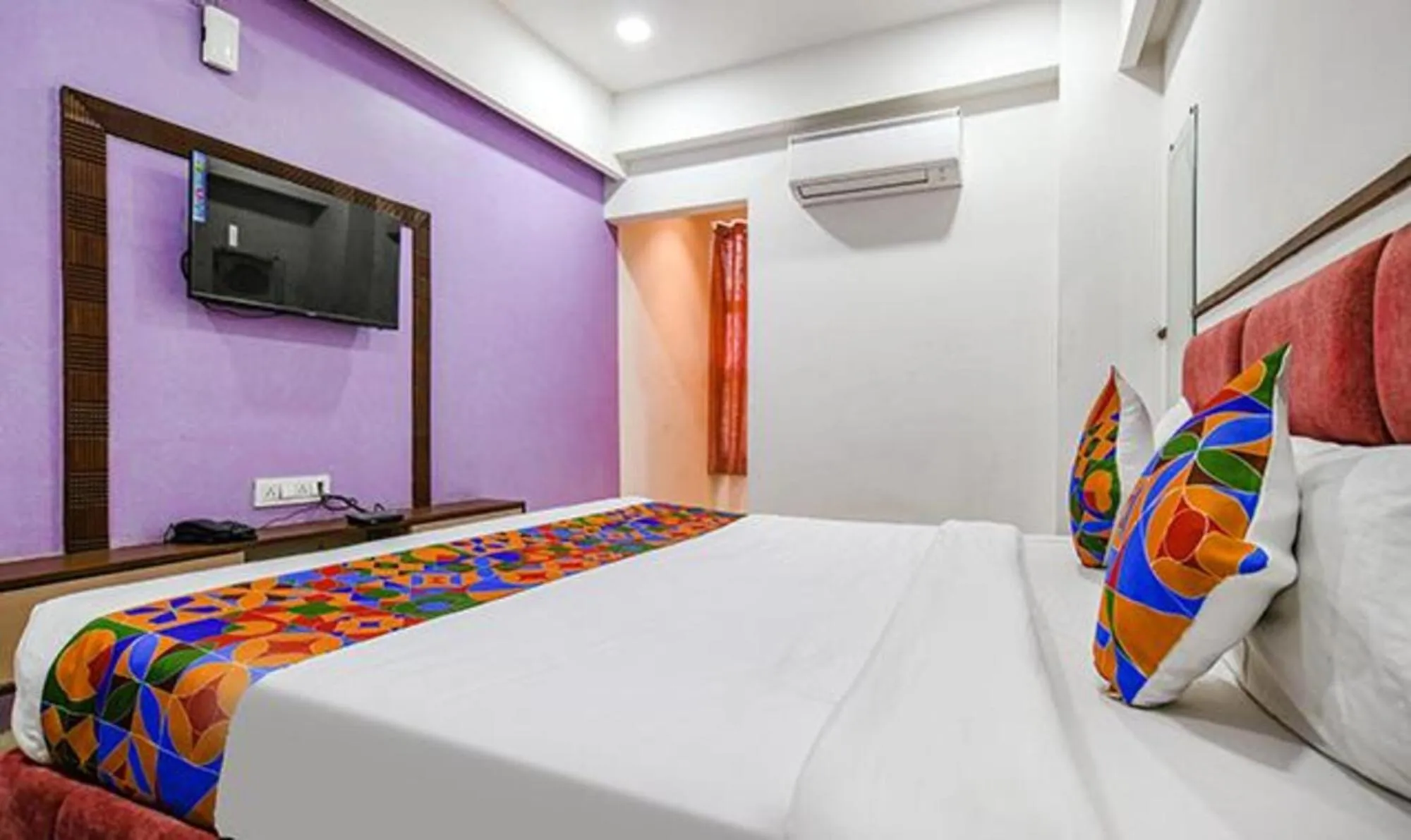 Bed in FabHotel Elite Residency