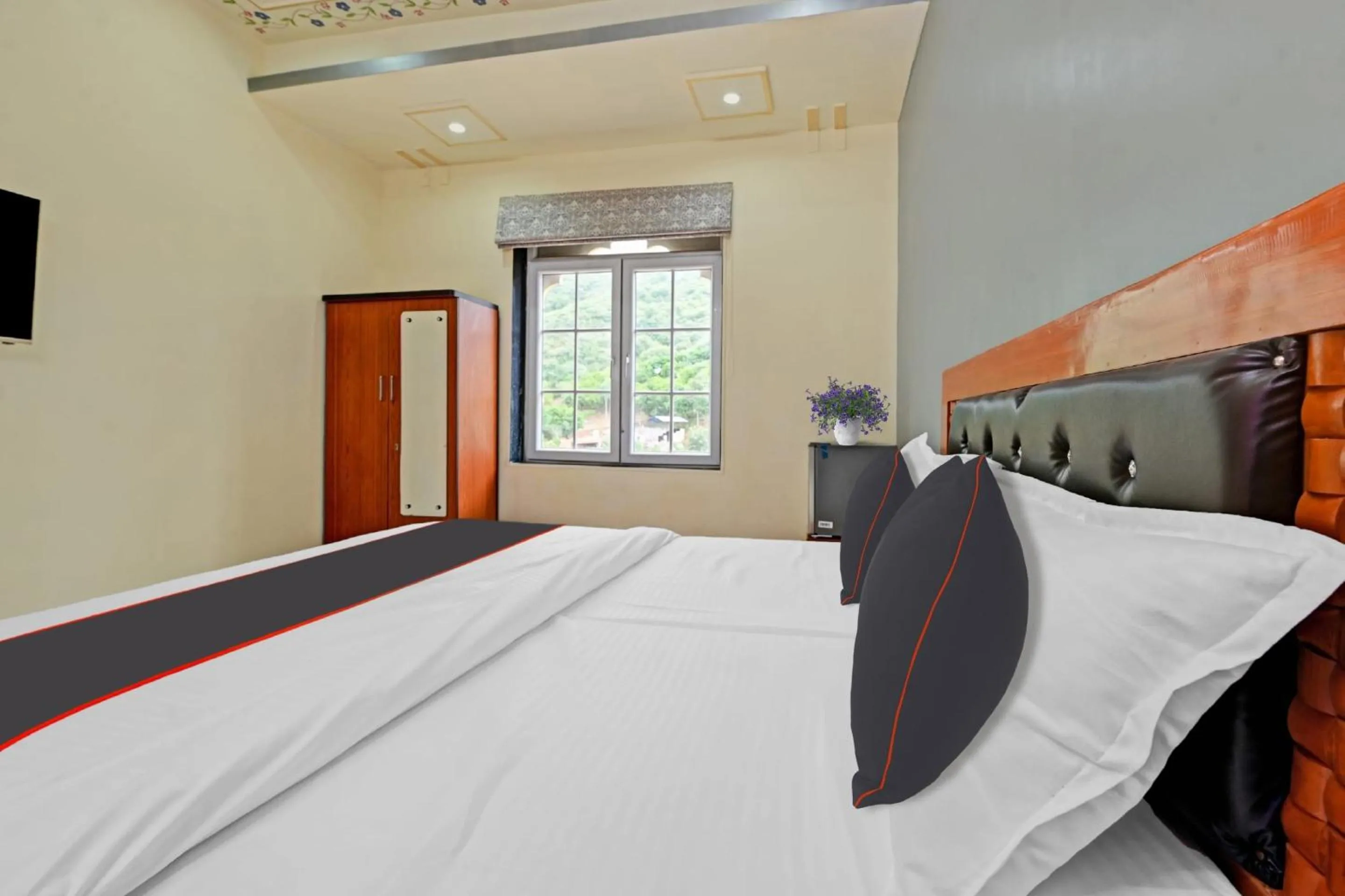 Bedroom in Hotel O by OYO Imperial Palace