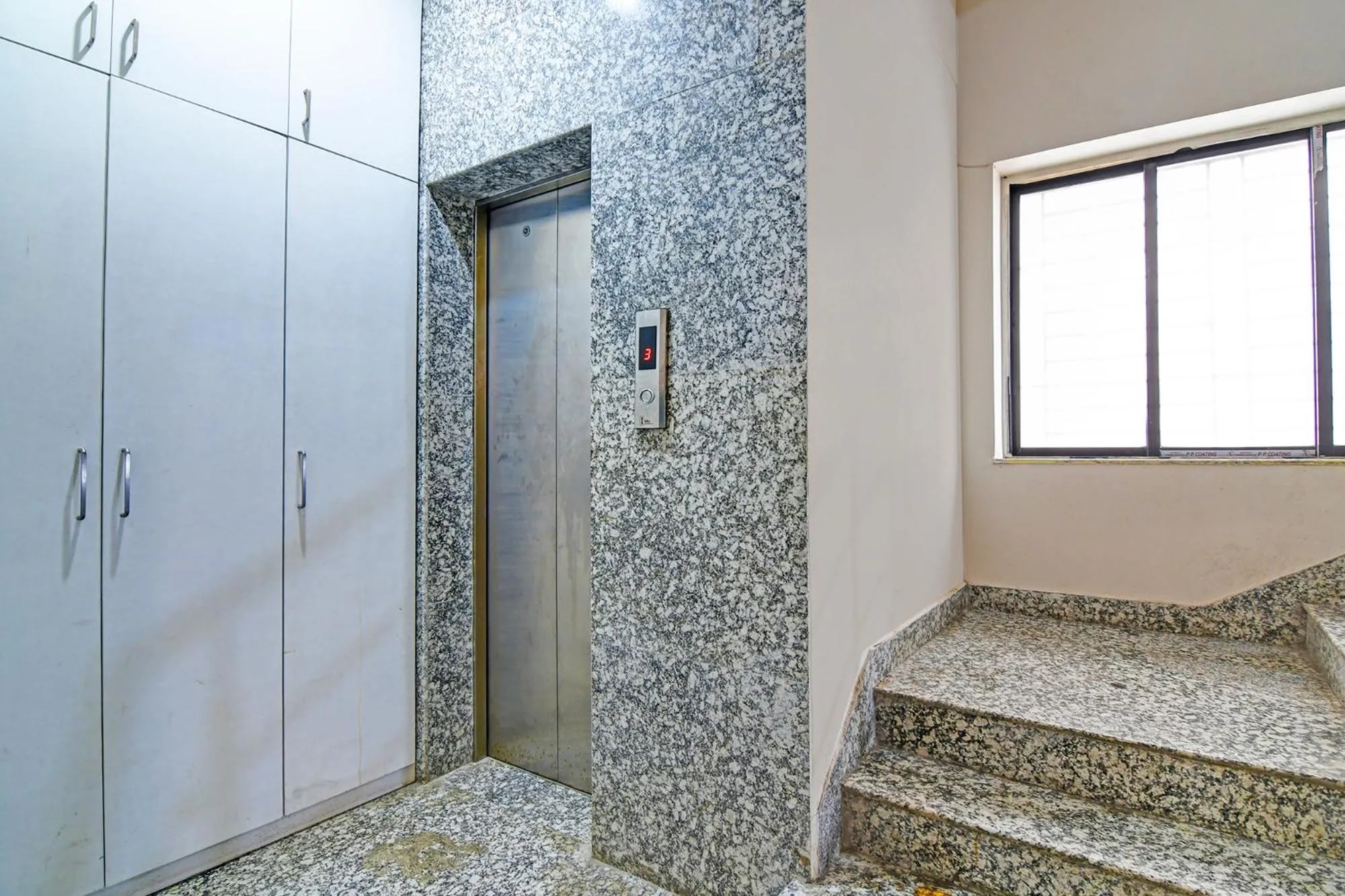 elevator in FabHotel Dak Plaza - Nr Axis Mall