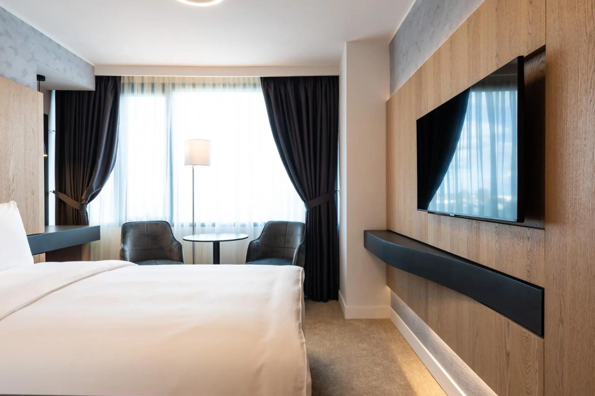 Photo of the whole room, Bed in Ramada by Wyndham Slatina Parc