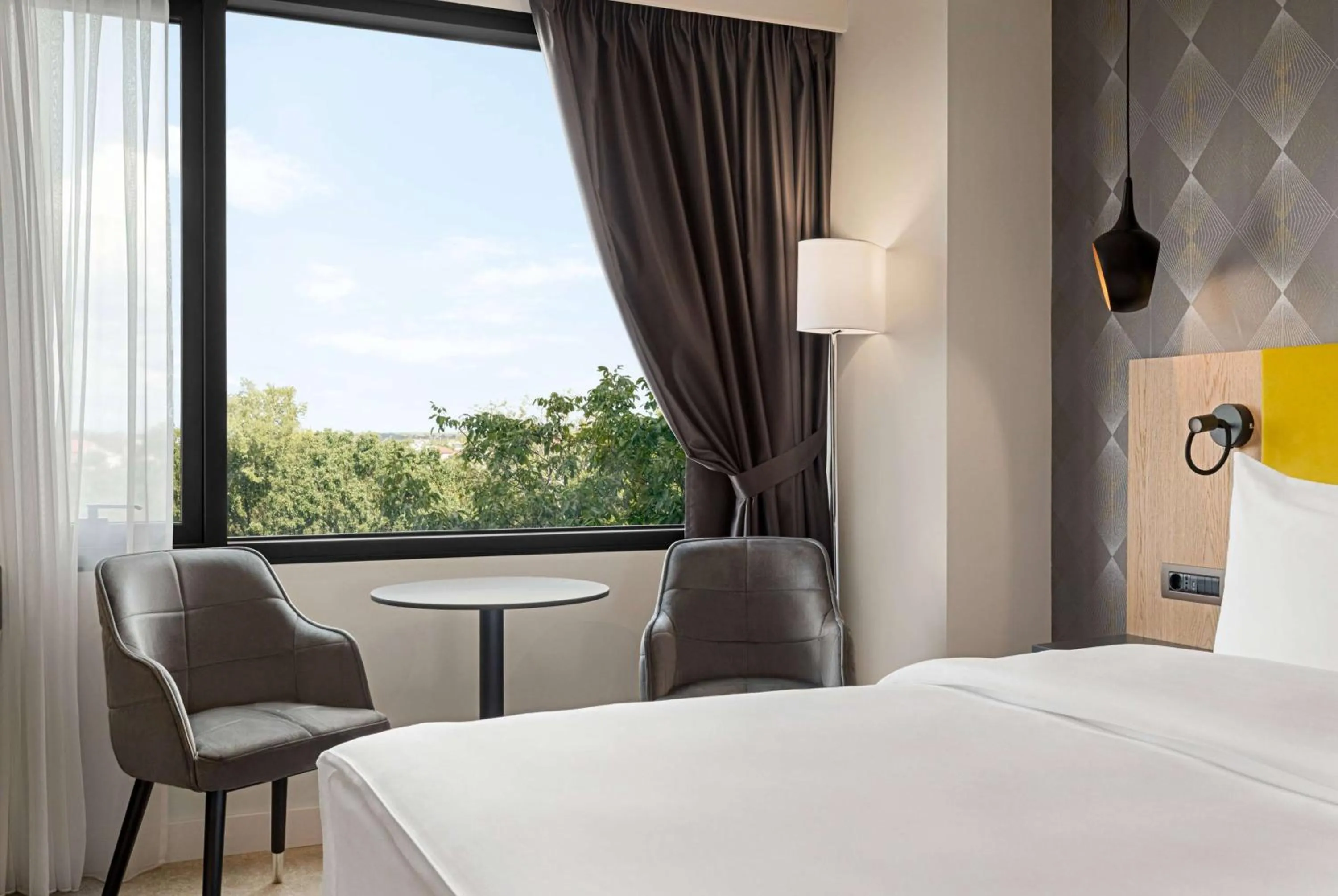 Bed in Ramada by Wyndham Slatina Parc