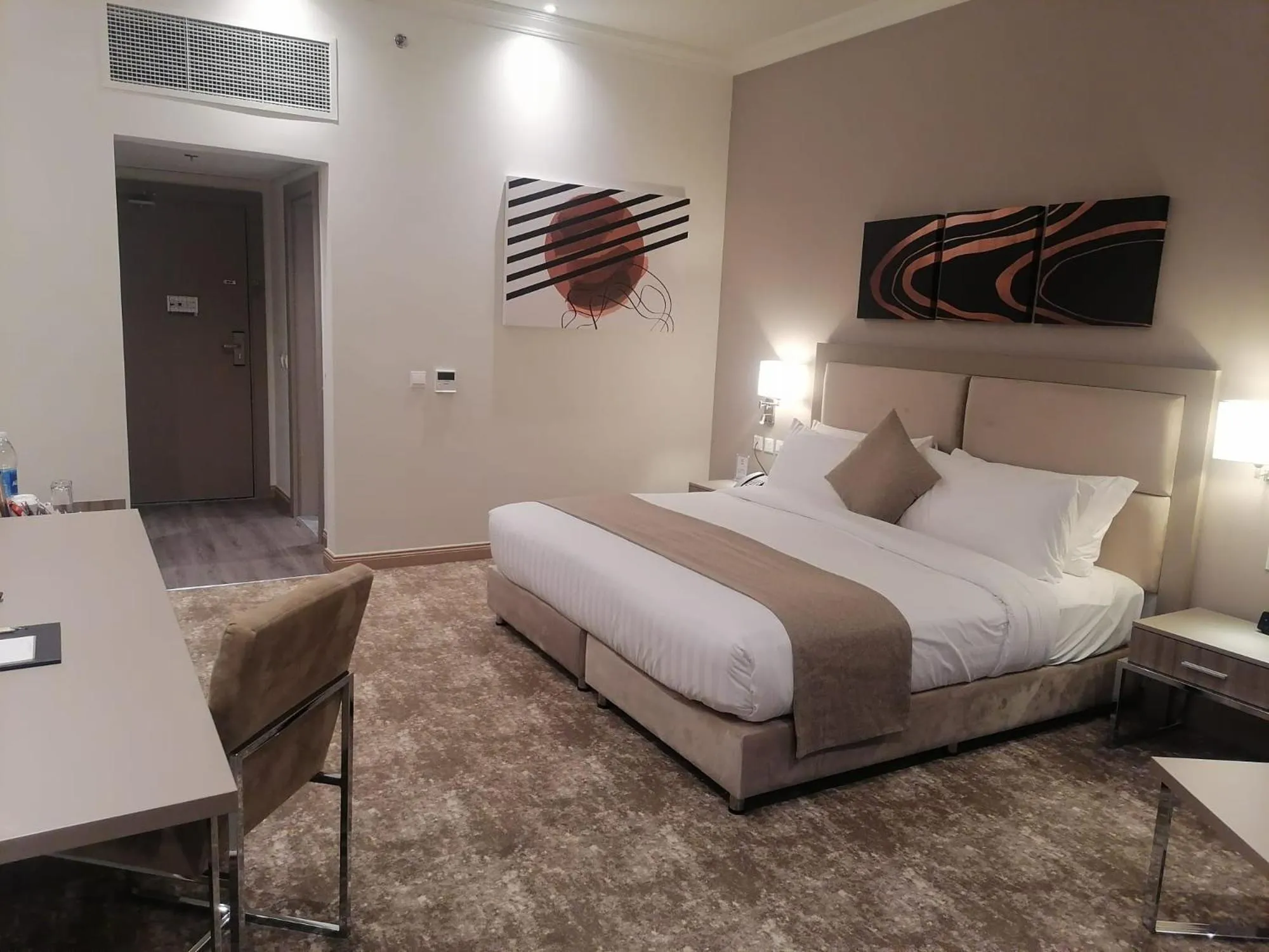 Bed in Gloria Hotel & Suites Doha