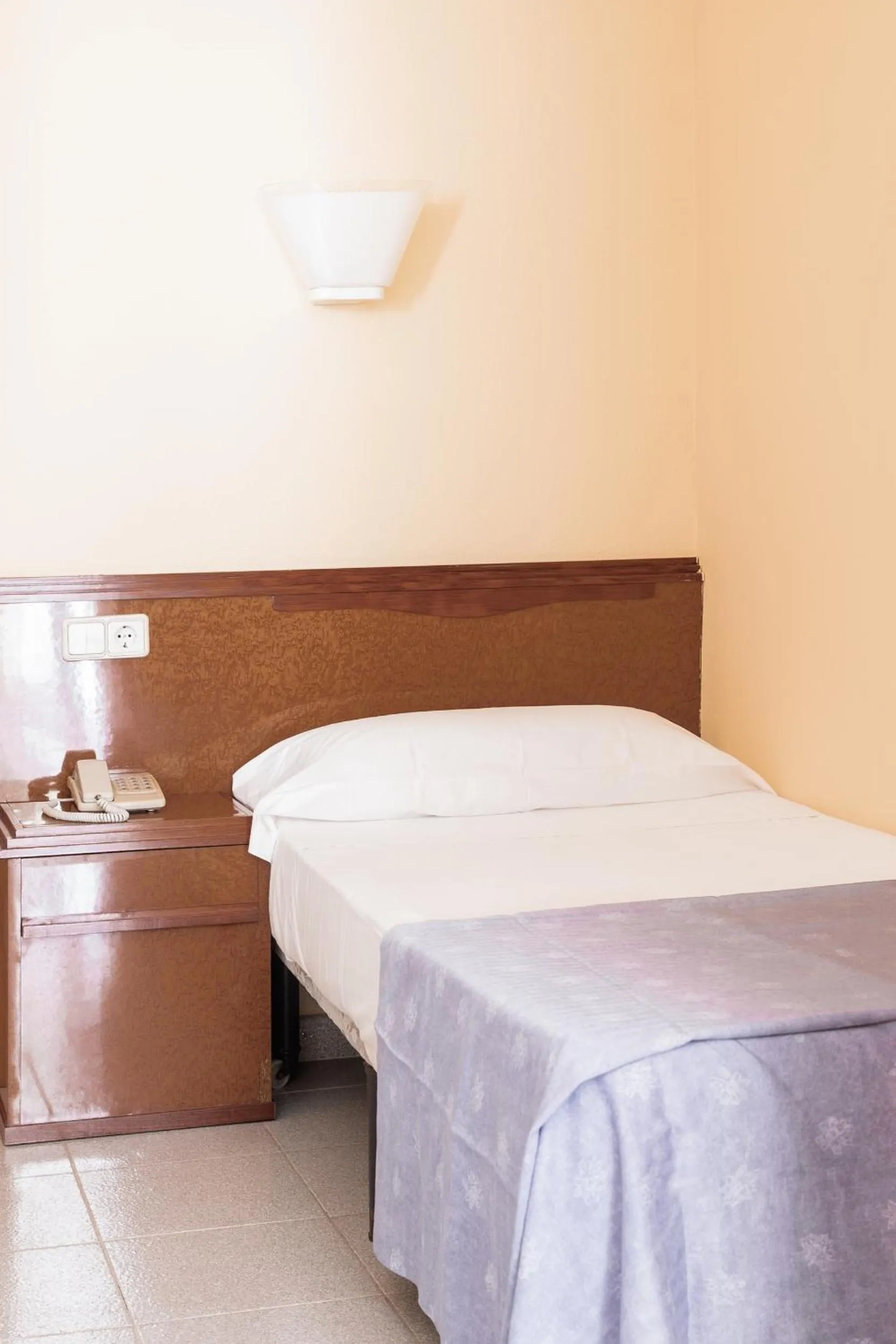 Bed in Hotel Golf Beach