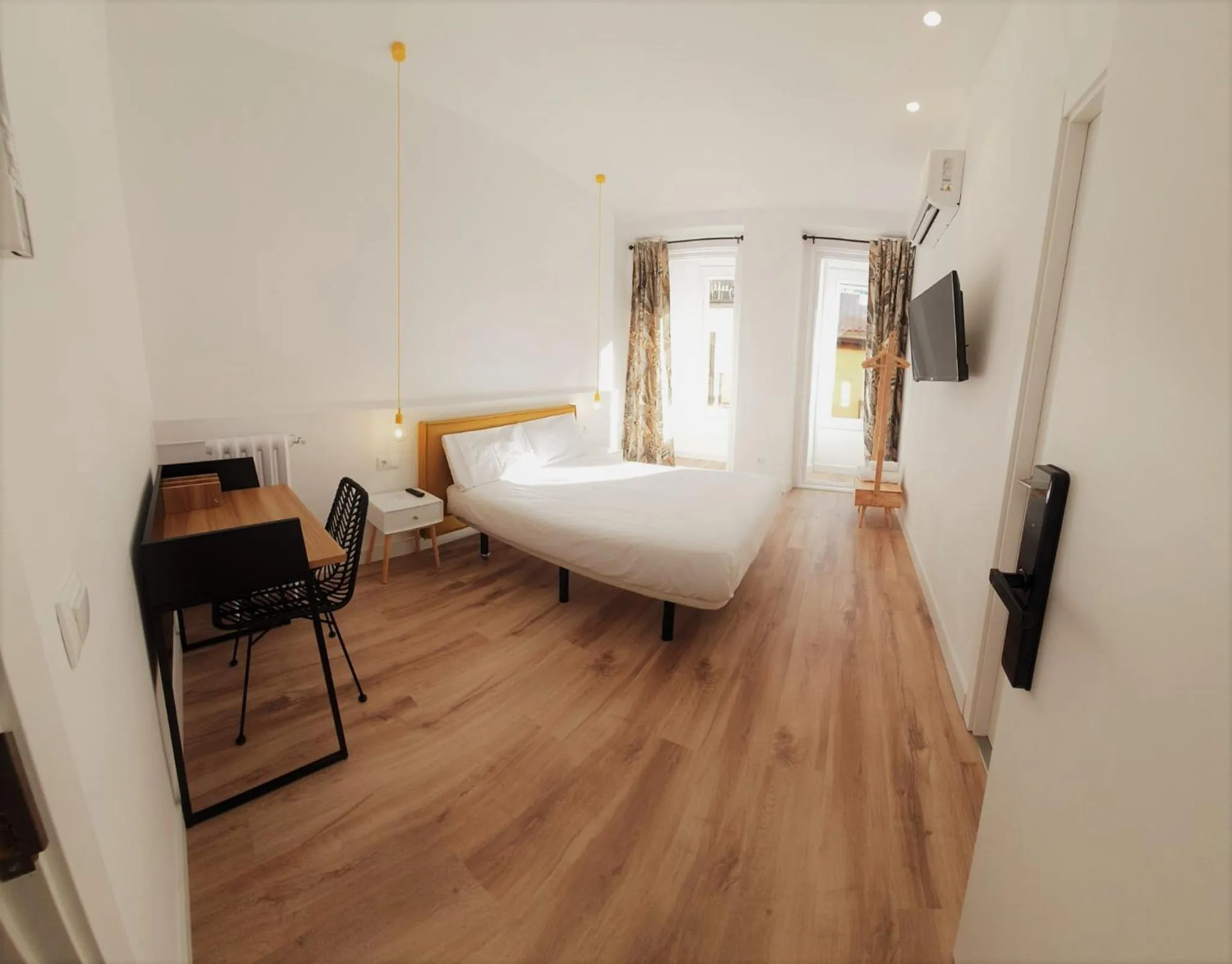 Bed in Hostal Manuela by gaiarooms