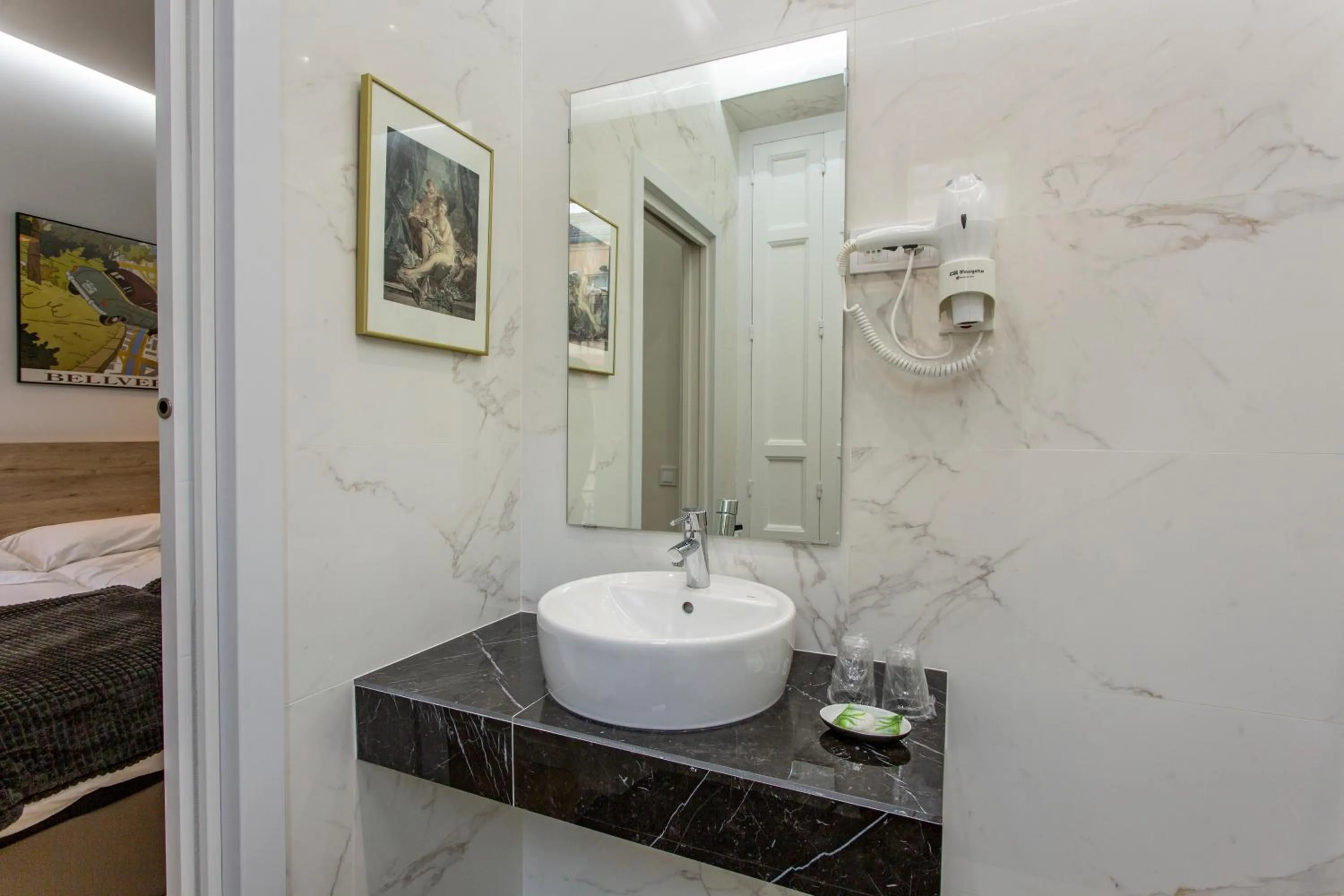 Bathroom in Hostal Manuela by gaiarooms