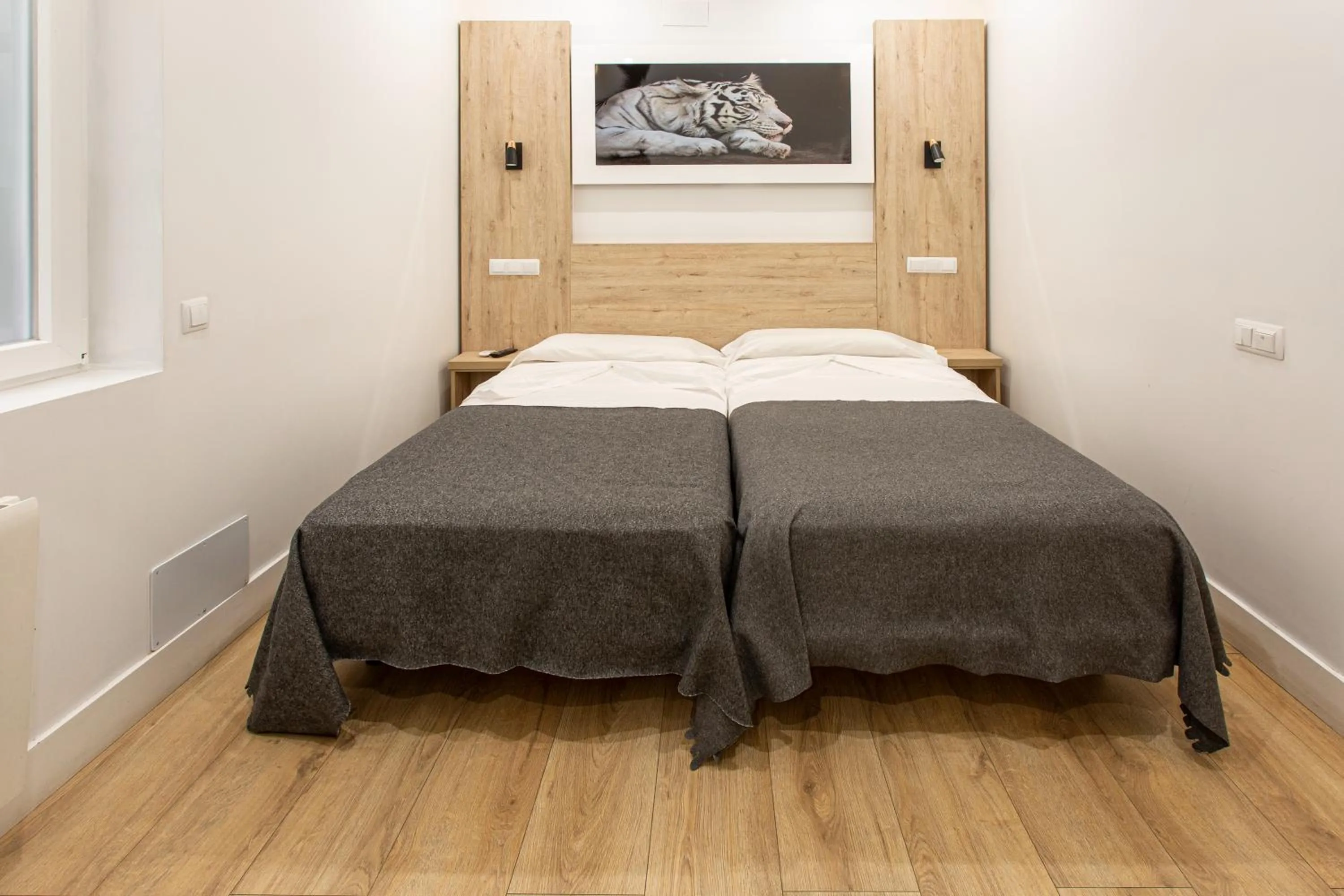 Bed in Hostal Manuela by gaiarooms