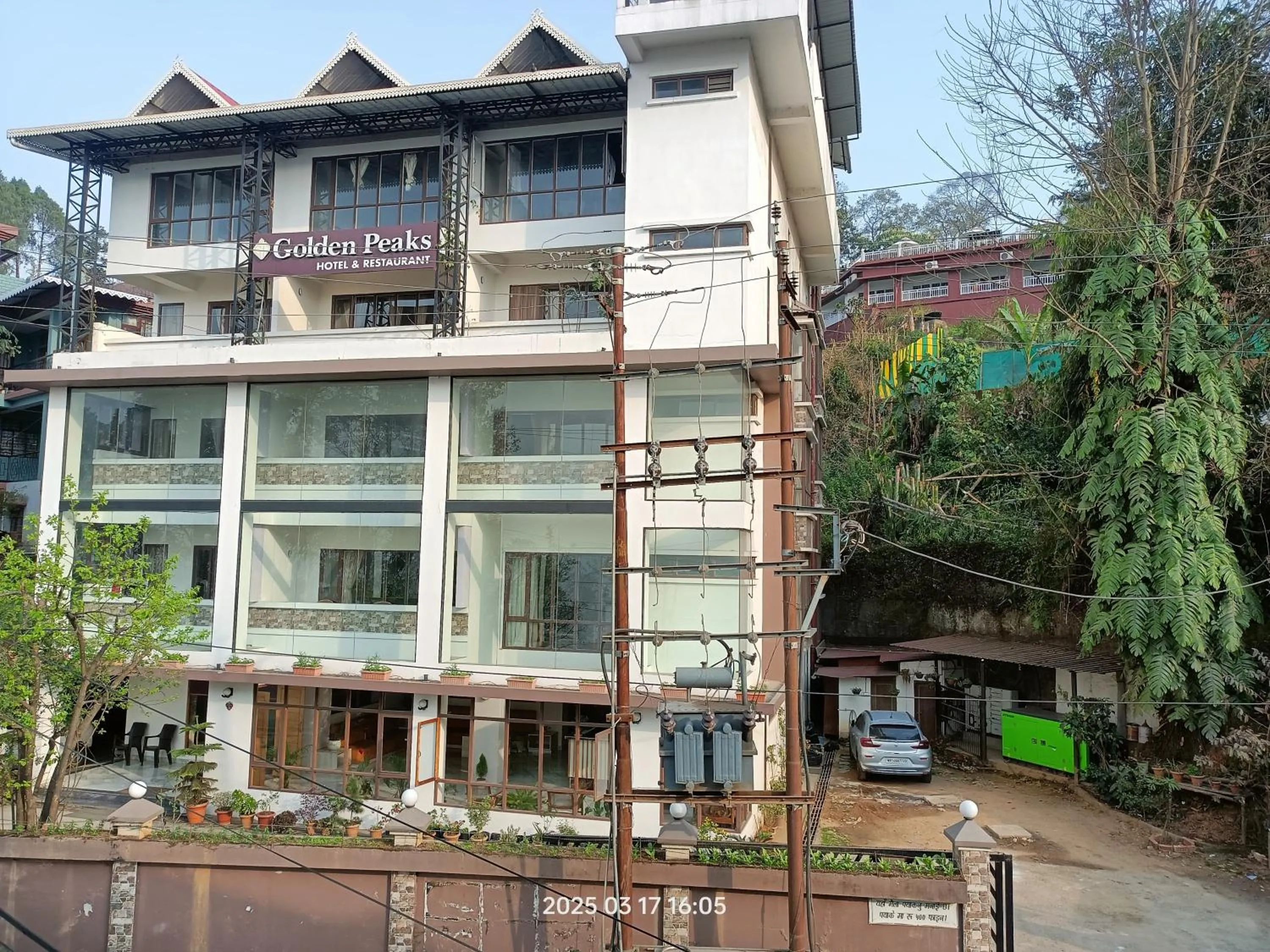 Property building in Golden Peaks Hotel & Restaurant