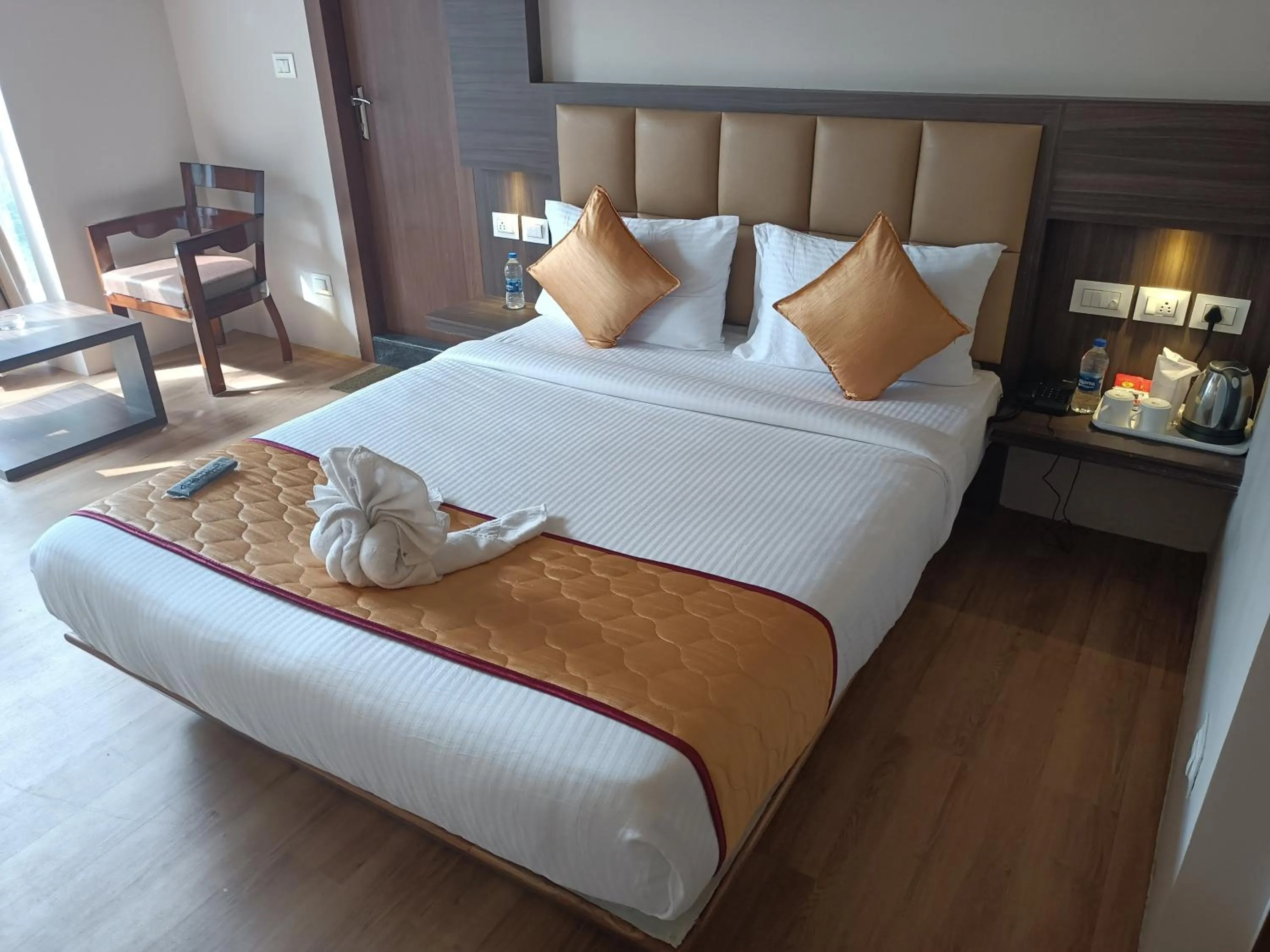 Bed in Golden Peaks Hotel & Restaurant