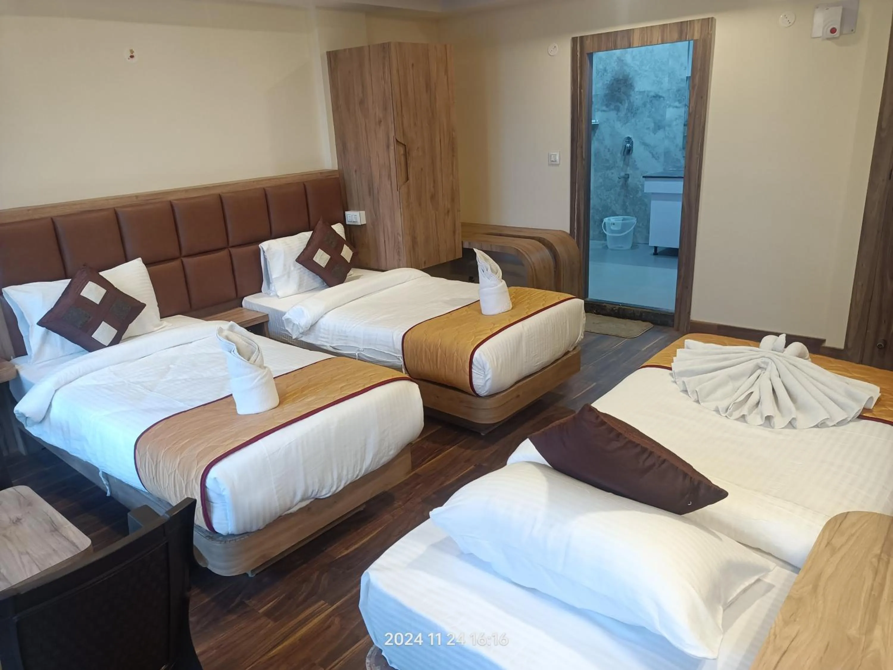 Bed in Golden Peaks Hotel & Restaurant