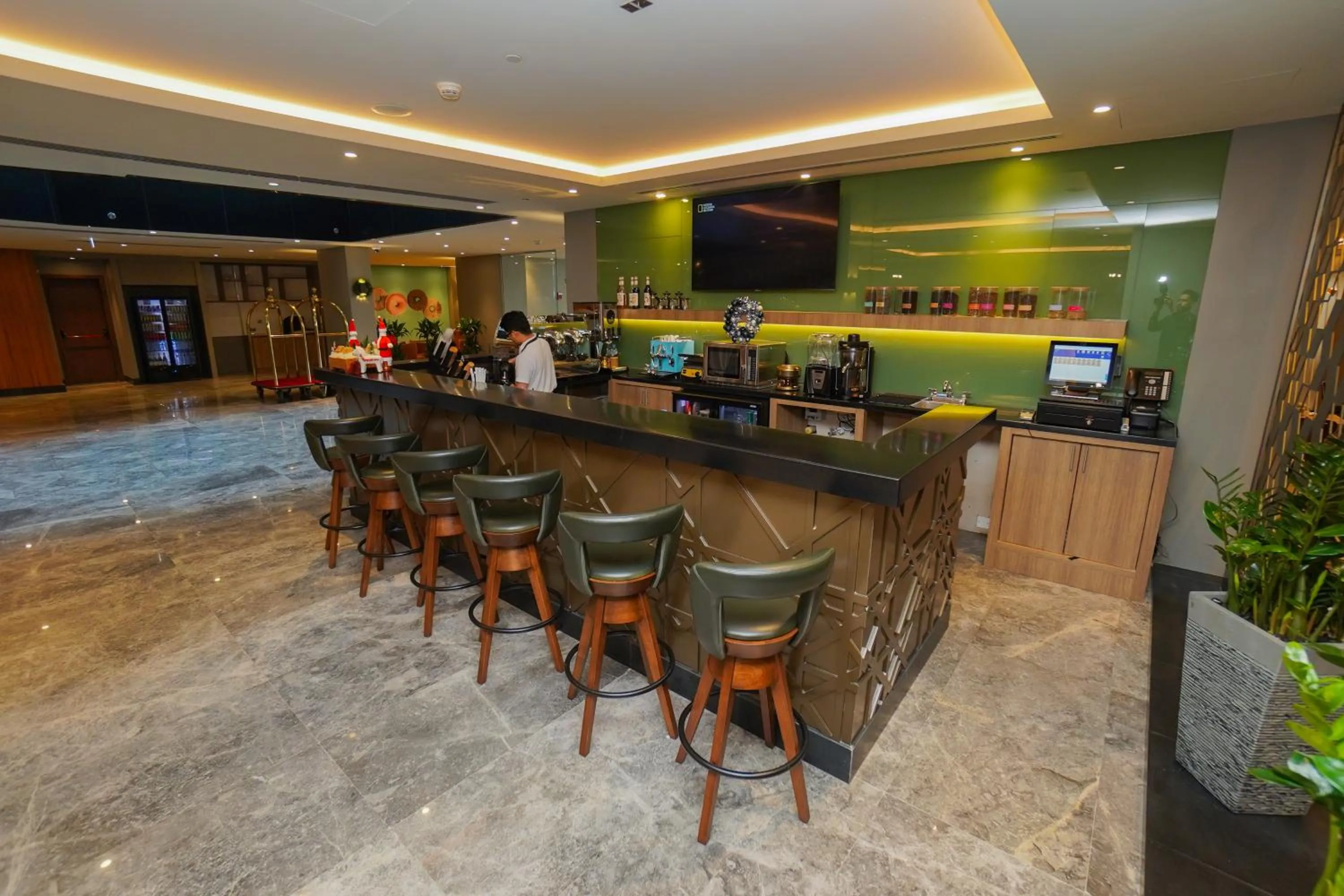 Lounge or bar in The Grand Lux Hotel